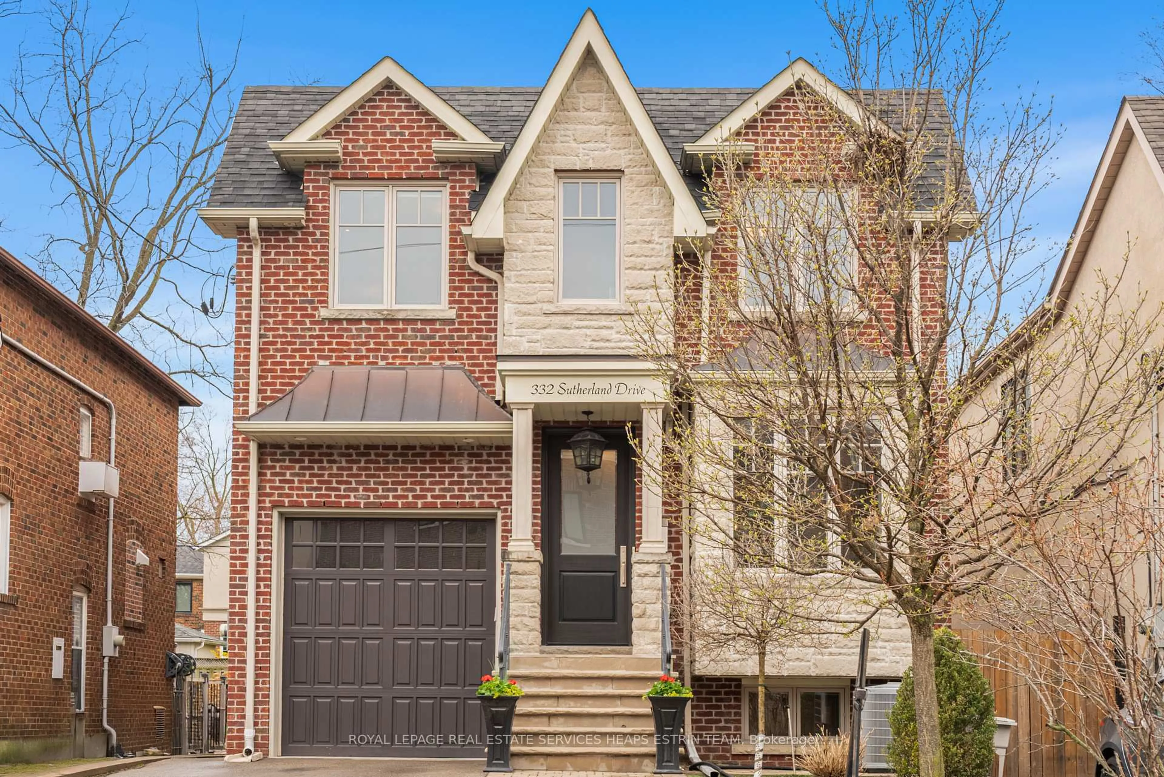 Home with brick exterior material, street for 332 Sutherland Dr, Toronto Ontario M4G 1J8