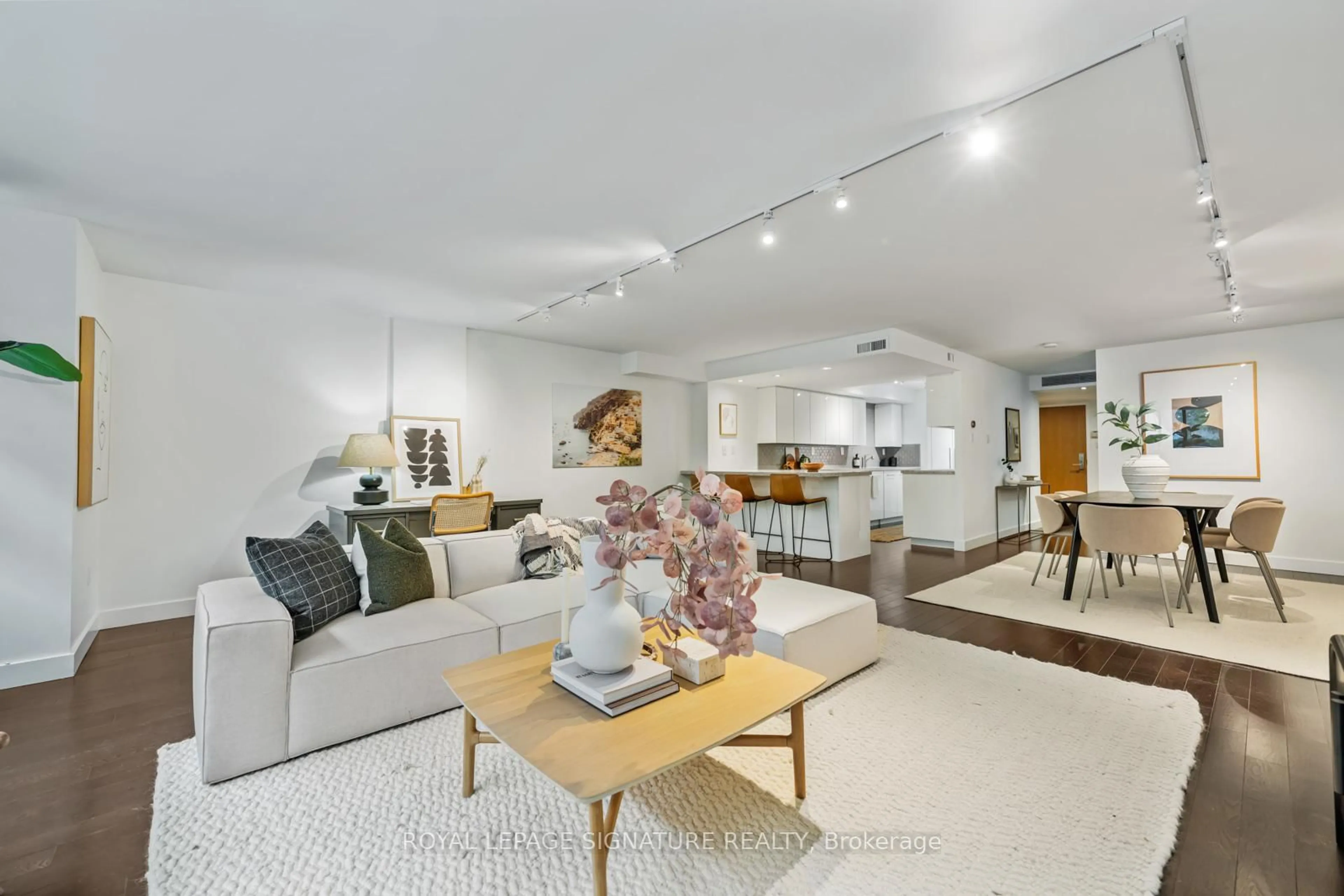 Living room with furniture, unknown for 80 Front St #227, Toronto Ontario M5E 1T4