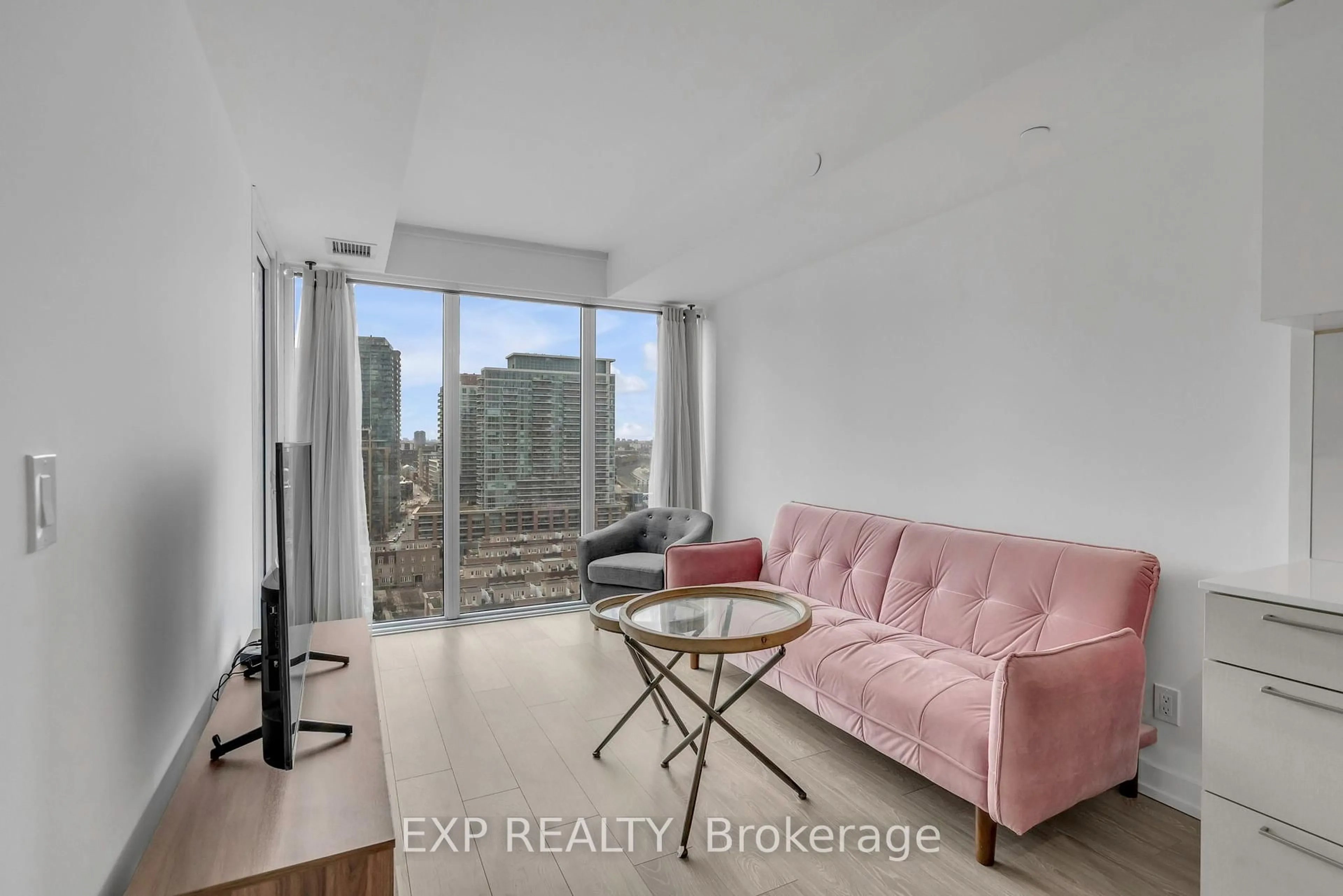 Living room with furniture, unknown for 19 Western Battery Rd #1712, Toronto Ontario M6K 0E3