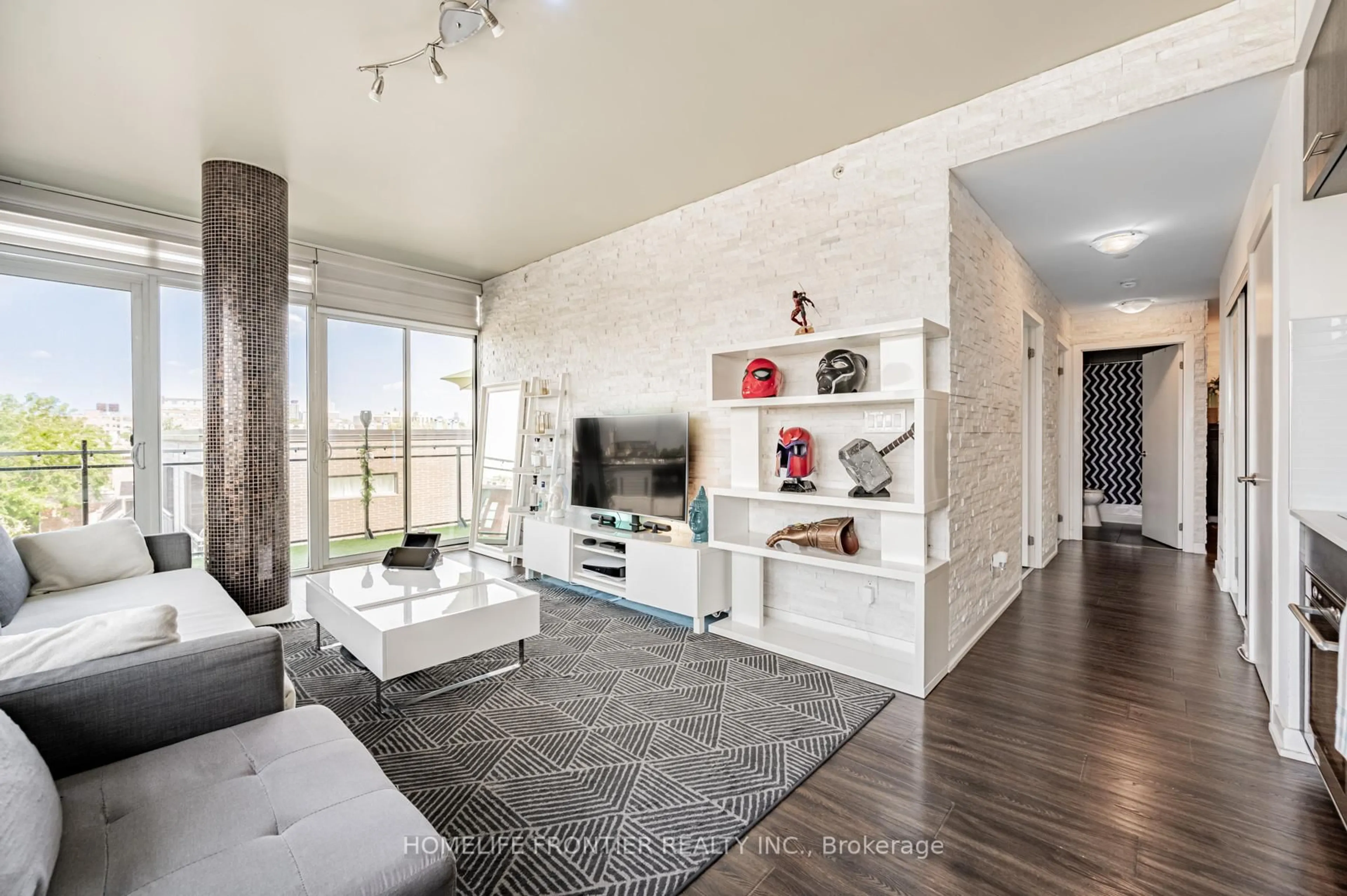 Living room with furniture, ceramic/tile floor for 205 Manning Ave #415, Toronto Ontario M6J 0E2