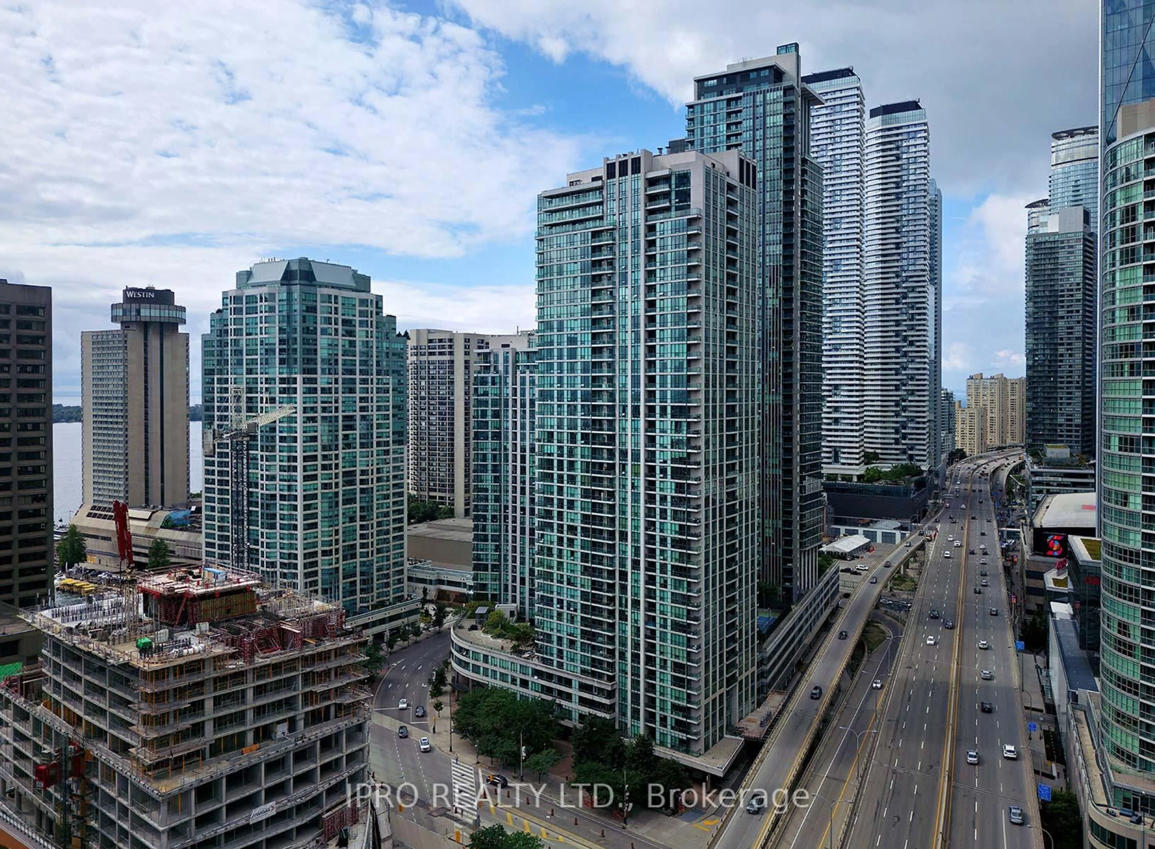 A pic from outside/outdoor area/front of a property/back of a property/a pic from drone, city buildings view from balcony for 16 Yonge St #2007, Toronto Ontario M5E 2A1