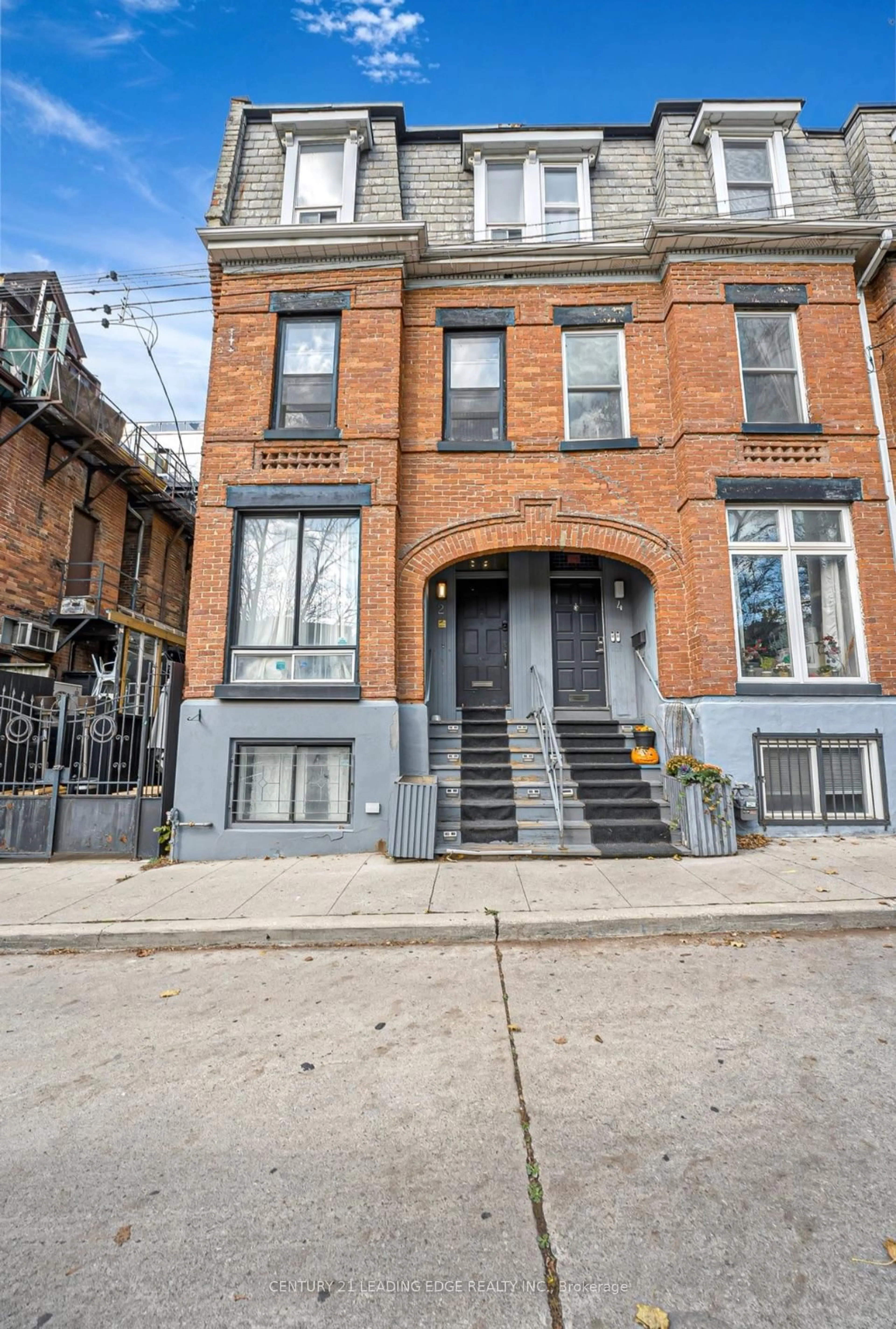 Home with brick exterior material, street for 2 Monteith St, Toronto Ontario M4Y 1K7