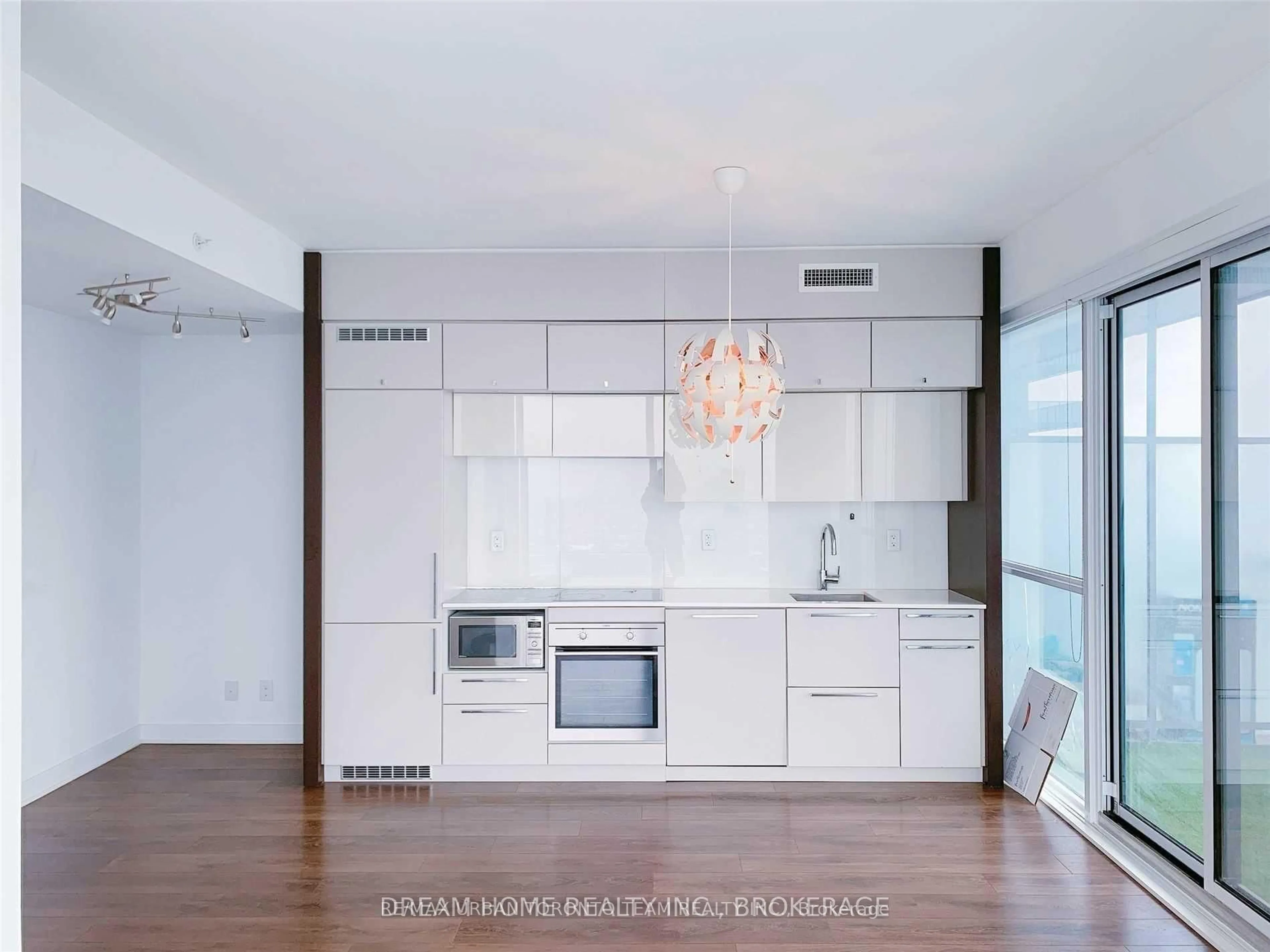 Open concept kitchen, wood/laminate floor for 15 Grenville St #4203, Toronto Ontario M4Y 1A1