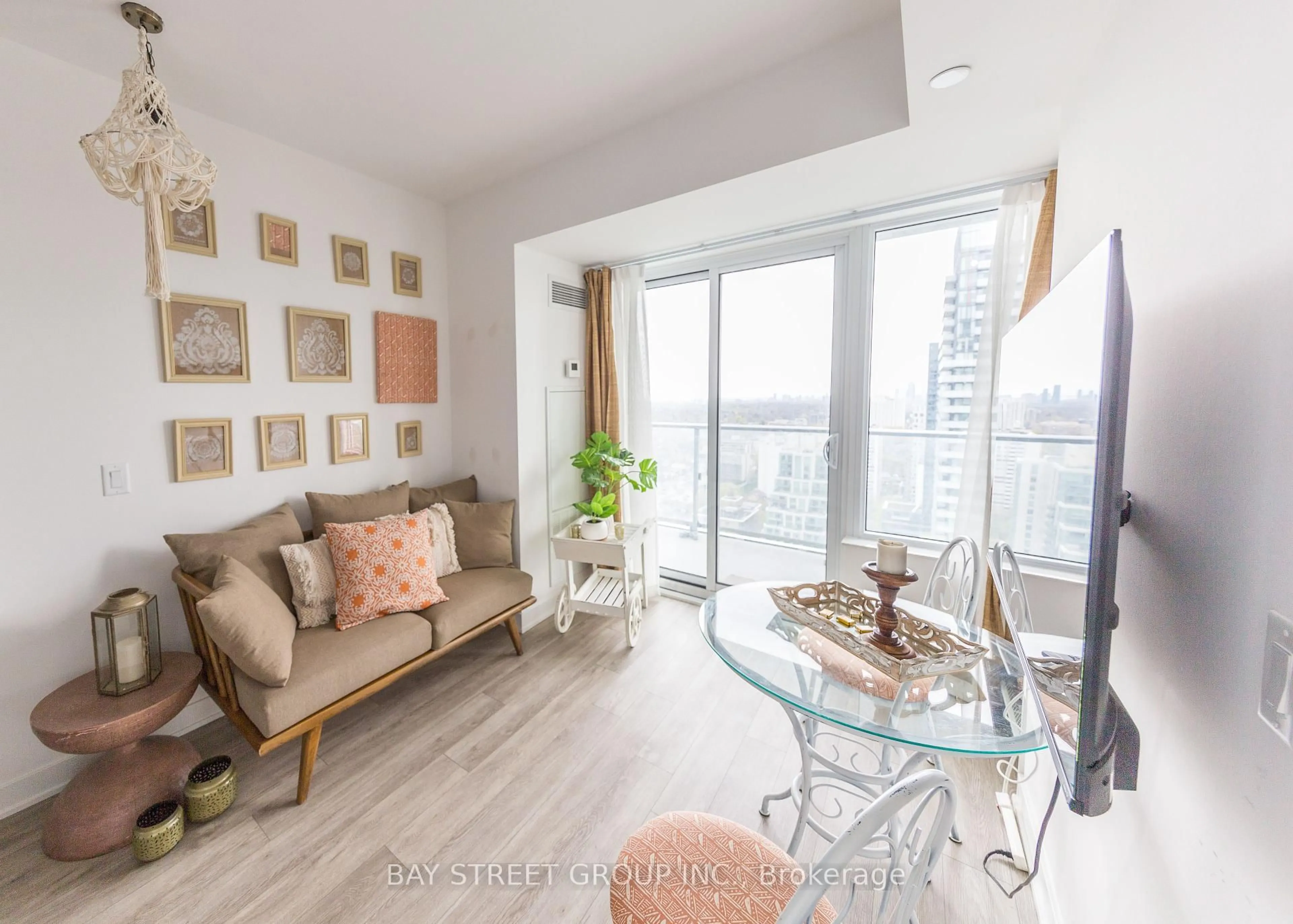 Living room with furniture, wood/laminate floor for 195 Redpath Ave #3106, Toronto Ontario M4P 0E4