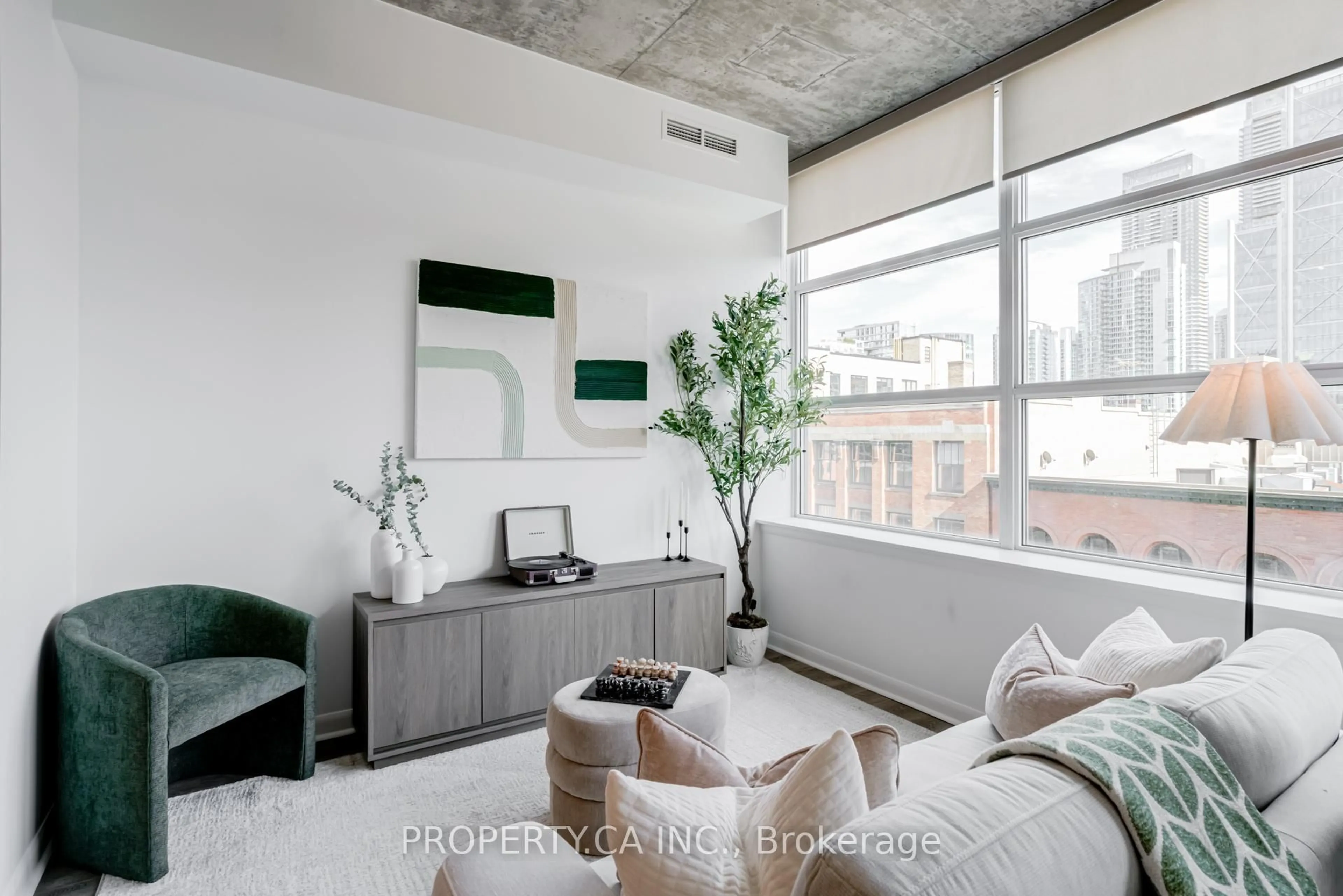 Living room with furniture, cement floor for 478 King St #509, Toronto Ontario M5V 0A8