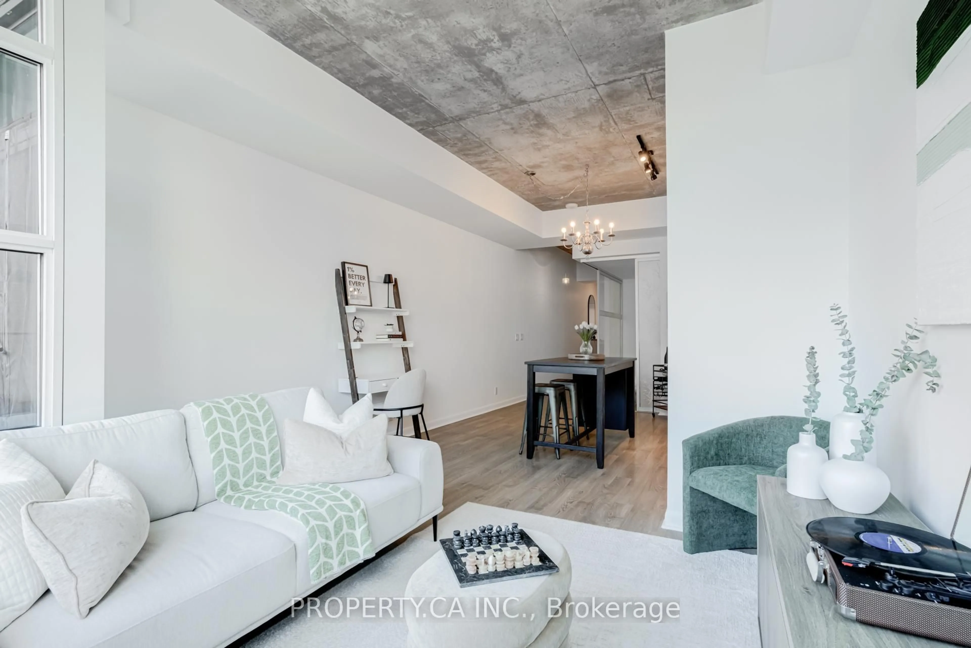 Living room with furniture, cement floor for 478 King St #509, Toronto Ontario M5V 0A8