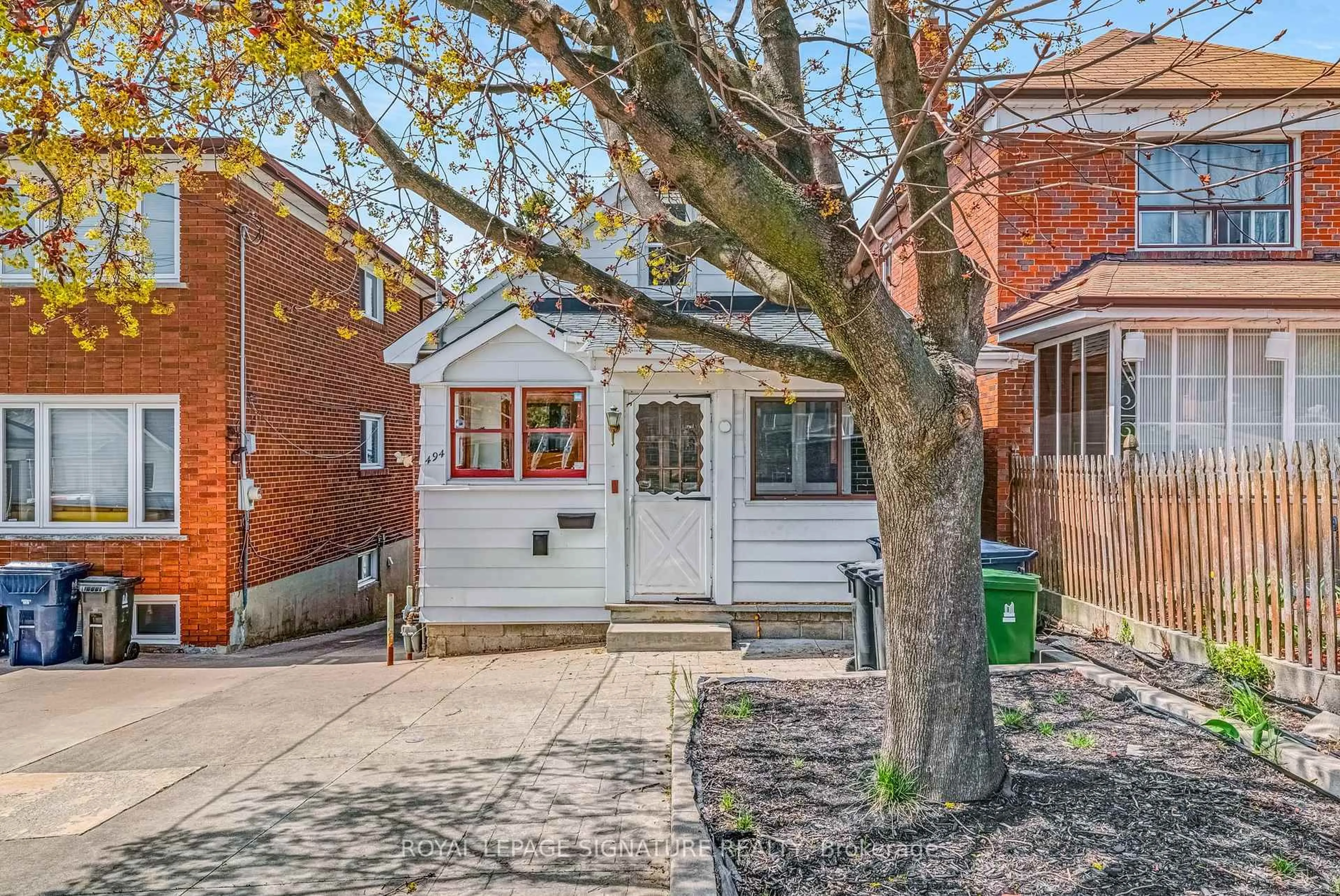 Home with brick exterior material, street for 494 Northcliffe Blvd, Toronto Ontario M6E 3L5