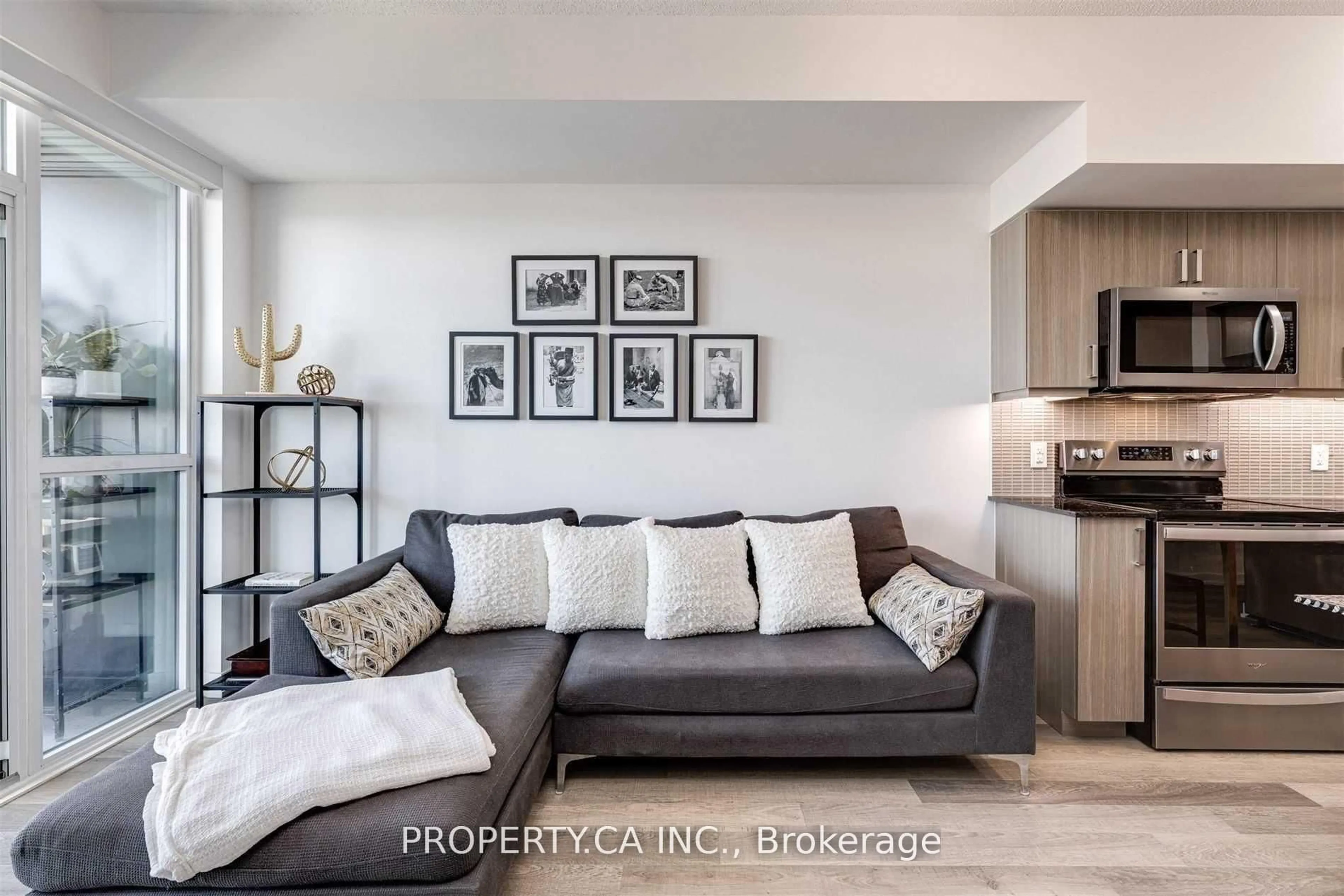 Living room with furniture, unknown for 1603 Eglinton Ave #1305, Toronto Ontario M6E 0A1