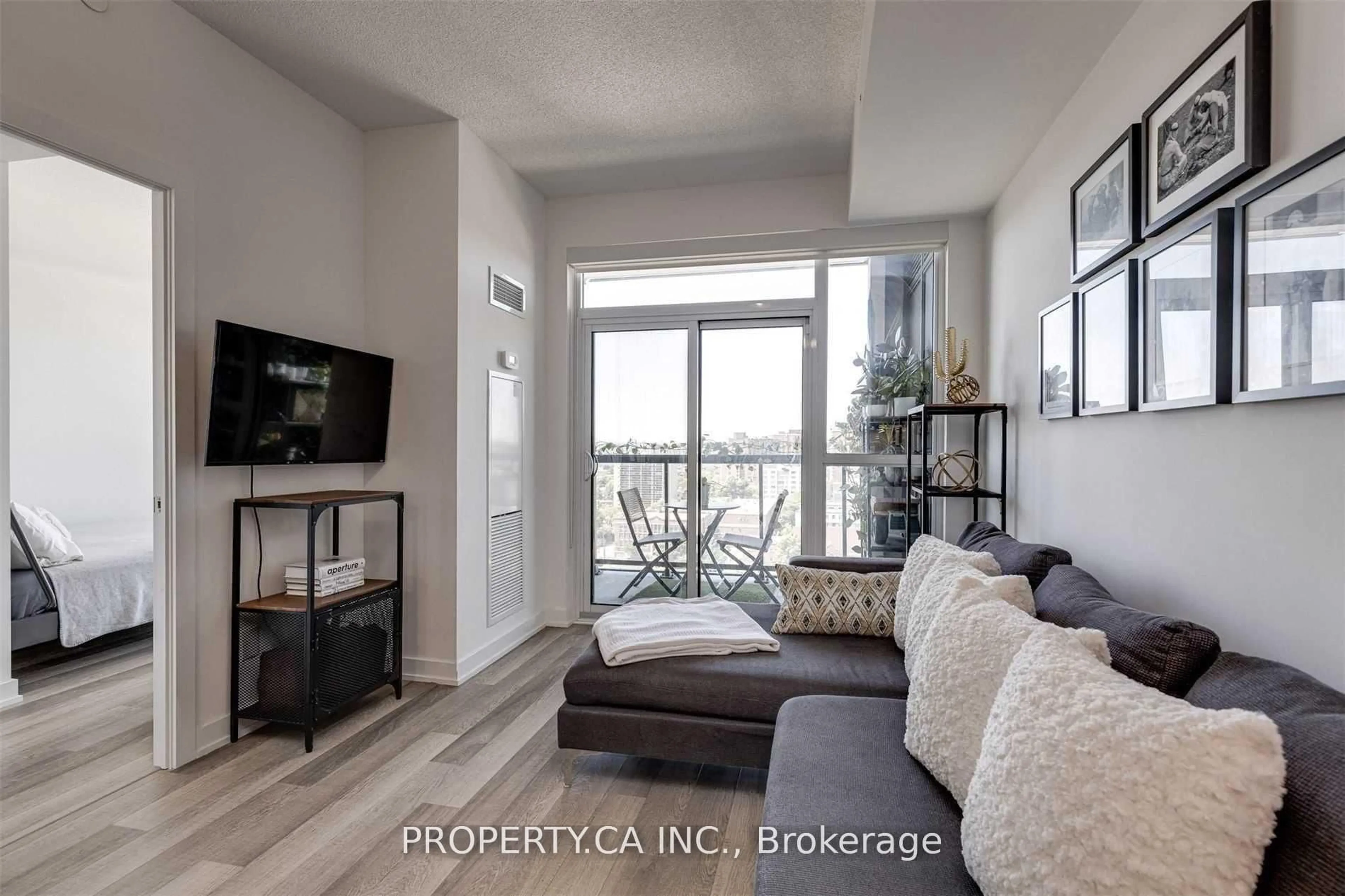 Living room with furniture, unknown for 1603 Eglinton Ave #1305, Toronto Ontario M6E 0A1