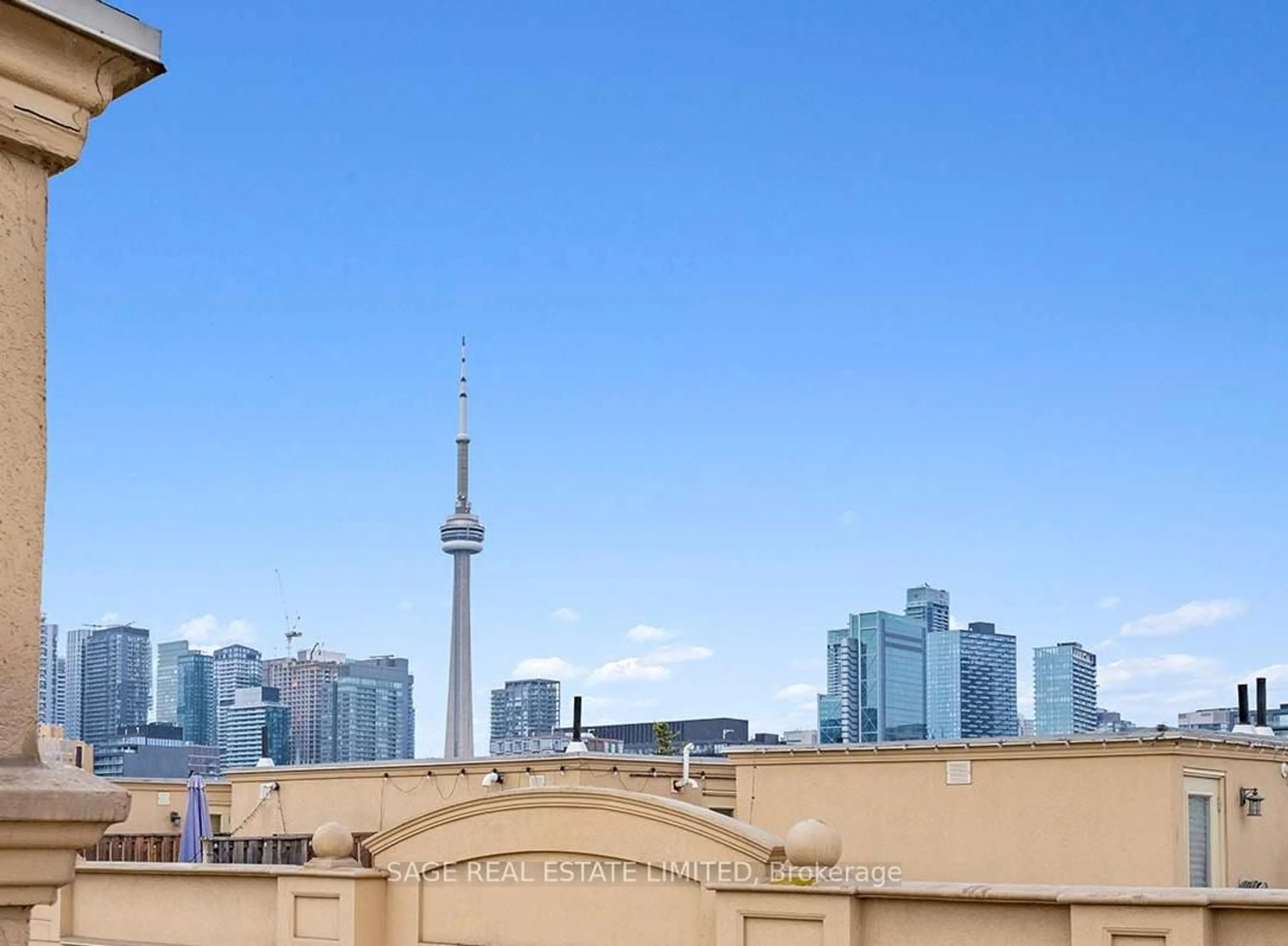 Balcony in the apartment, city buildings view from balcony for 78 Carr St #5, Toronto Ontario M5T 1B7