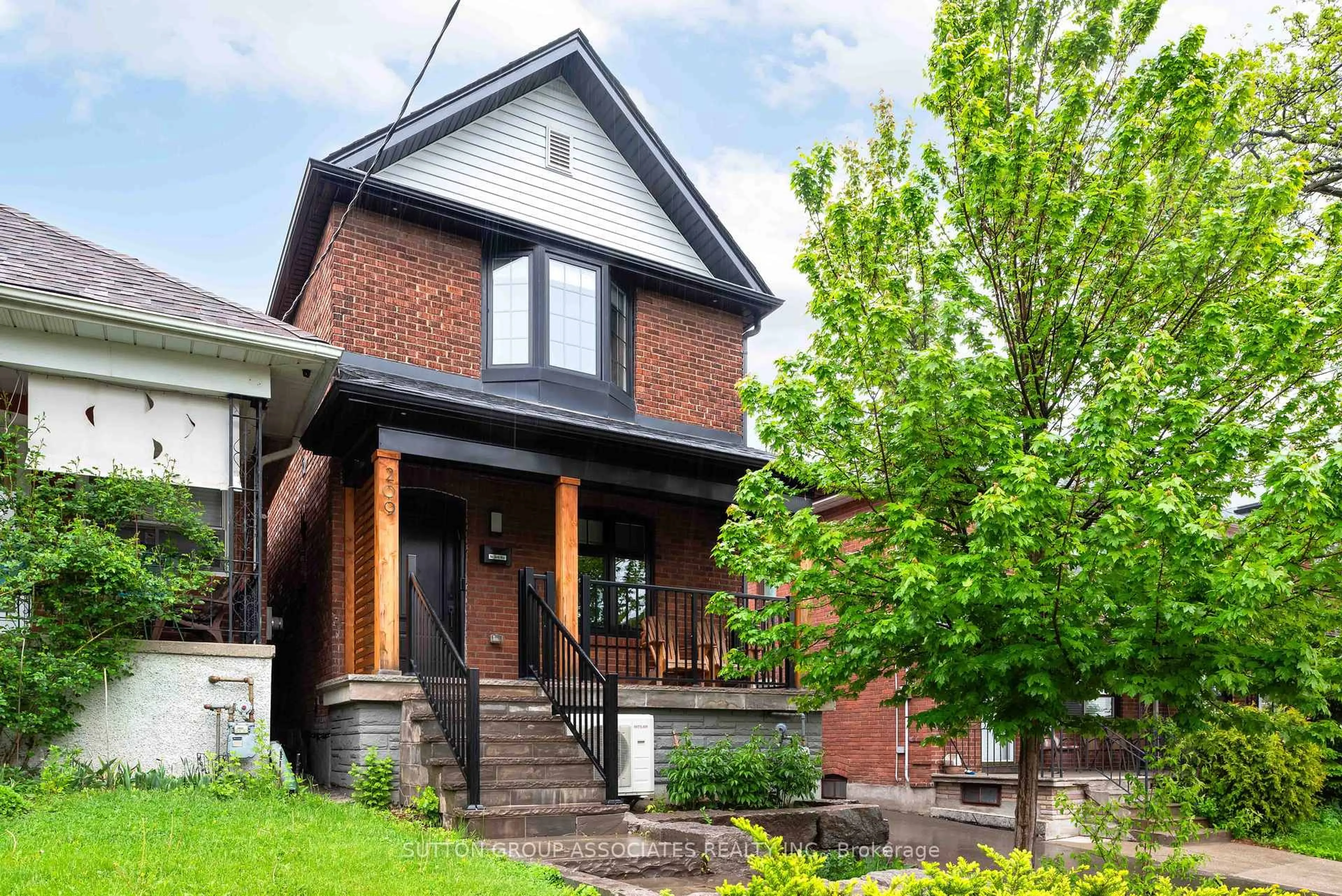 Home with brick exterior material, street for 209 Atlas Ave, Toronto Ontario M6C 3P6