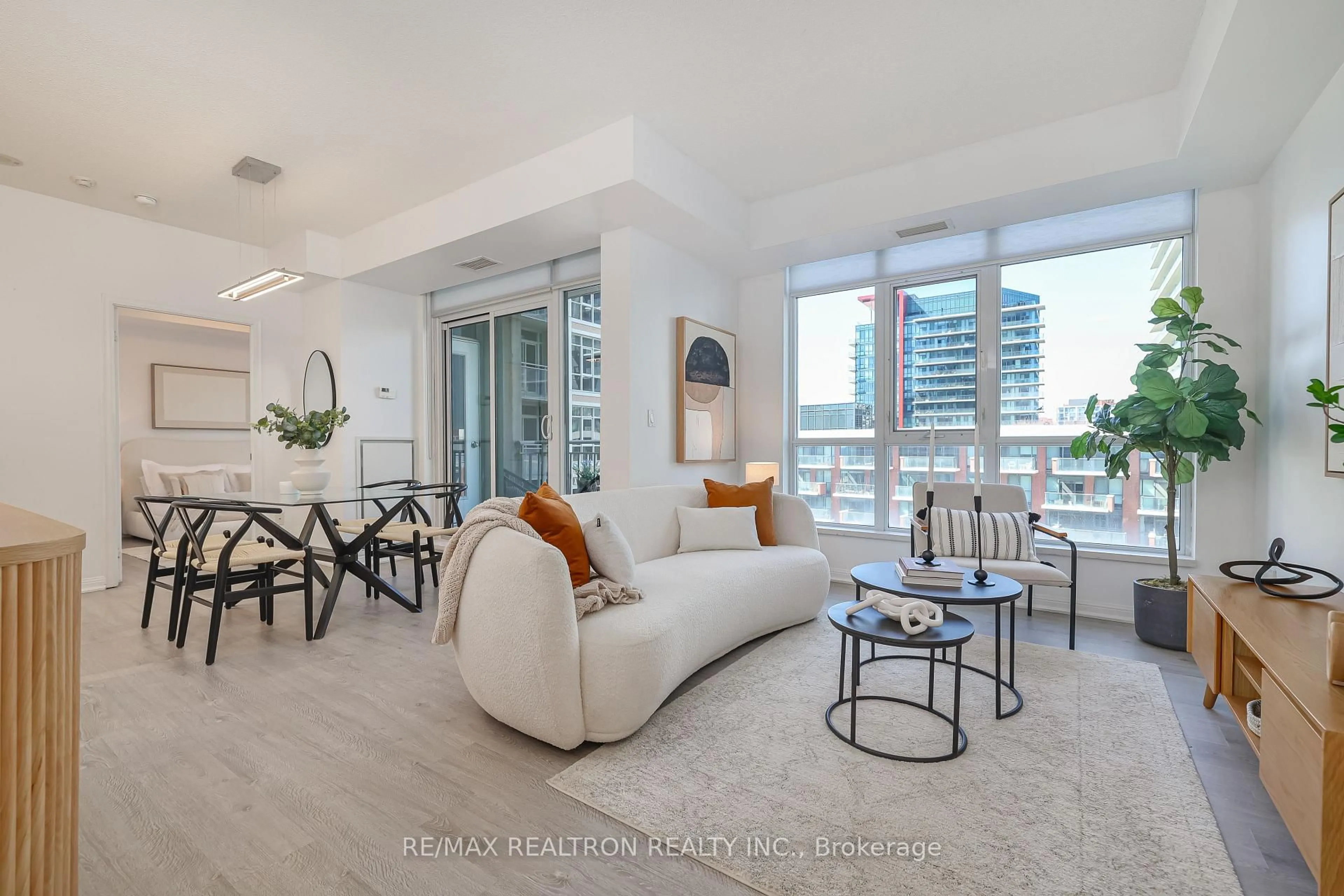 Living room with furniture, unknown for 21 Grand Magazine St #710, Toronto Ontario M5V 1B5