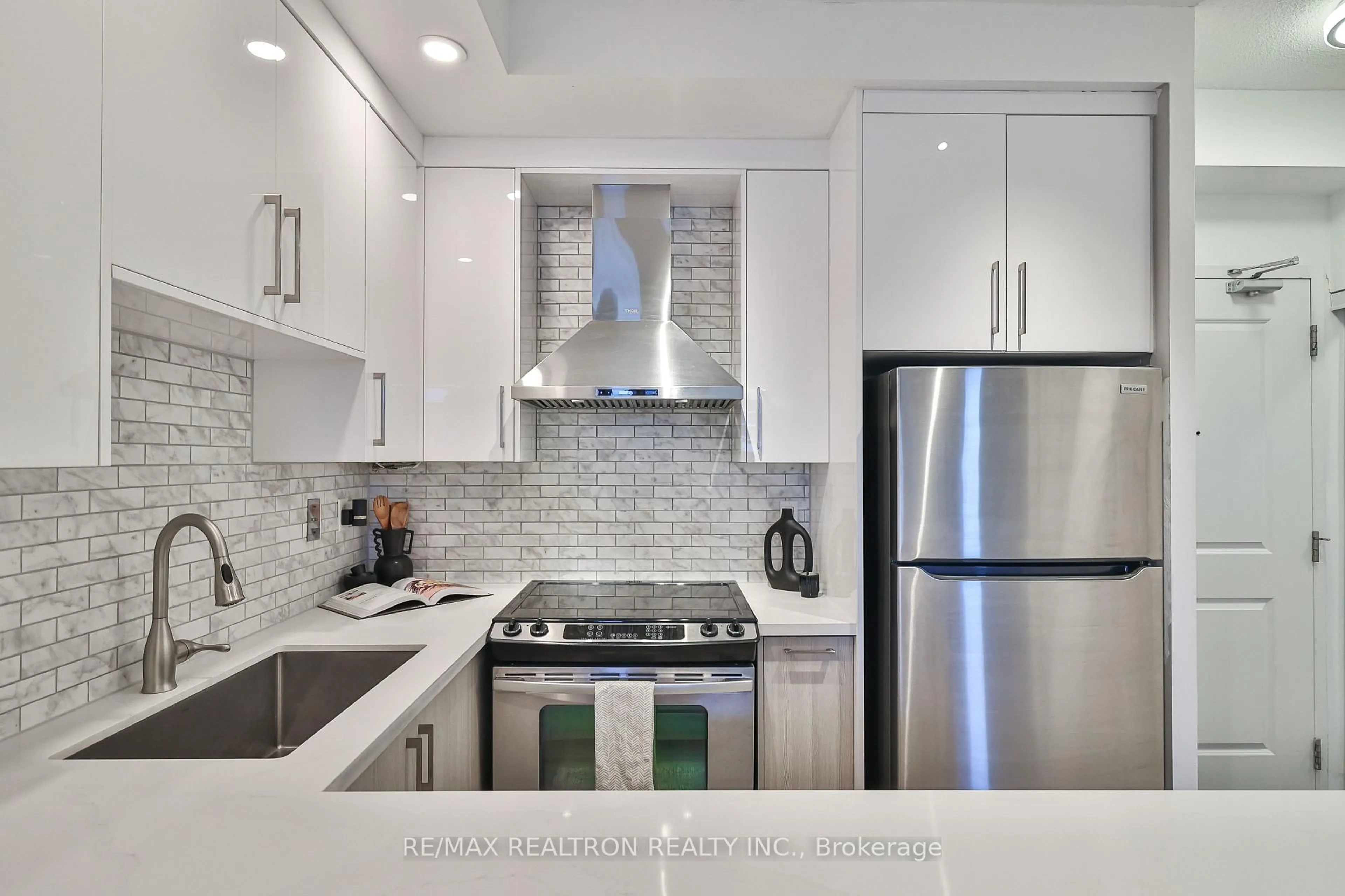 Contemporary kitchen, ceramic/tile floor for 21 Grand Magazine St #710, Toronto Ontario M5V 1B5