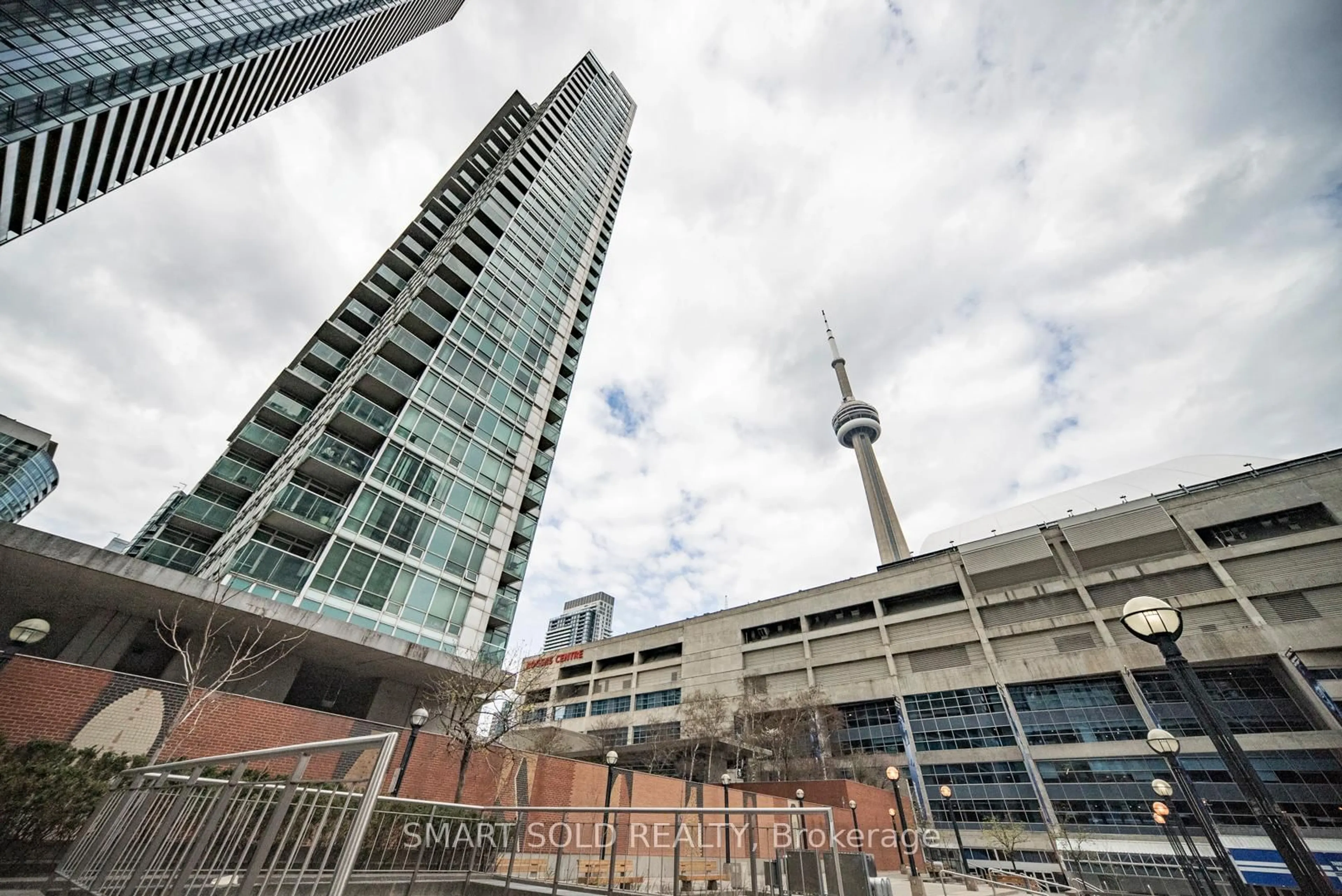 Patio, city buildings view from balcony for 81 Navy Wharf Crt #2710, Toronto Ontario M5V 3S2