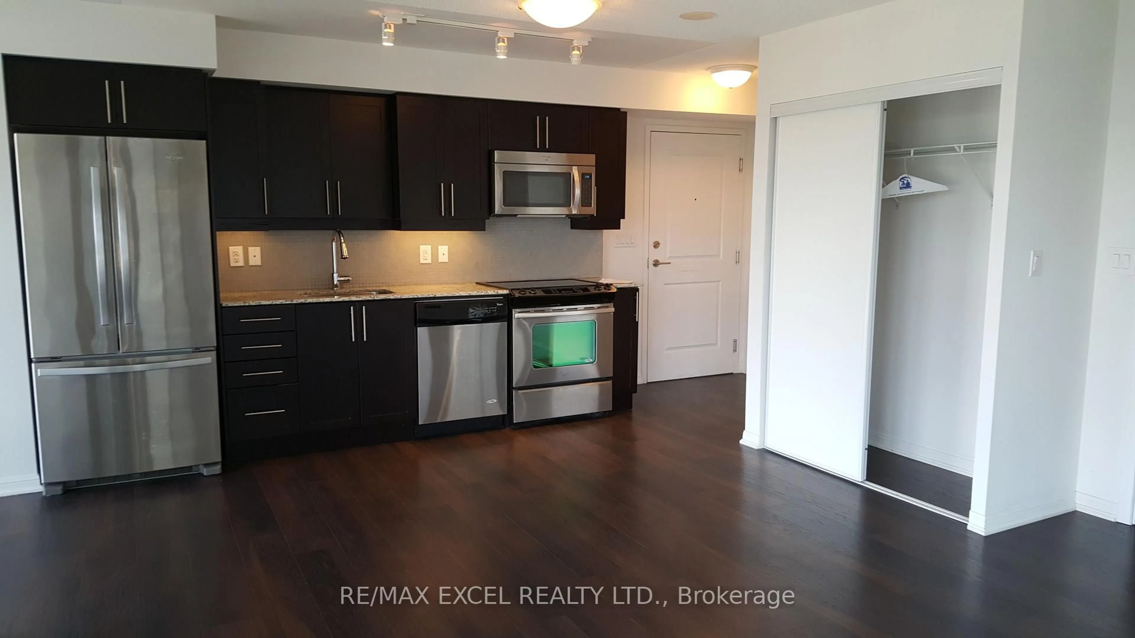 Standard kitchen, wood/laminate floor for 38 Grand Magazine St #1545, Toronto Ontario M5V 0B1