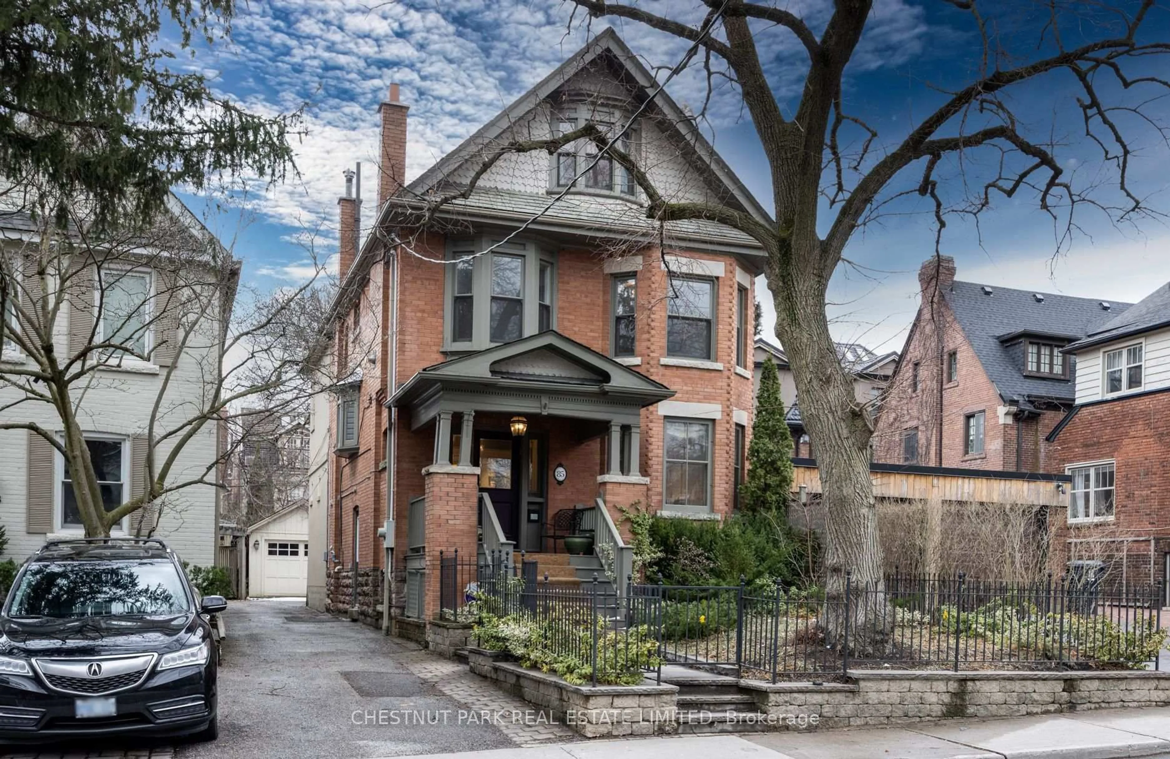 Home with brick exterior material, street for 85 Duggan Ave, Toronto Ontario M4V 1Y1