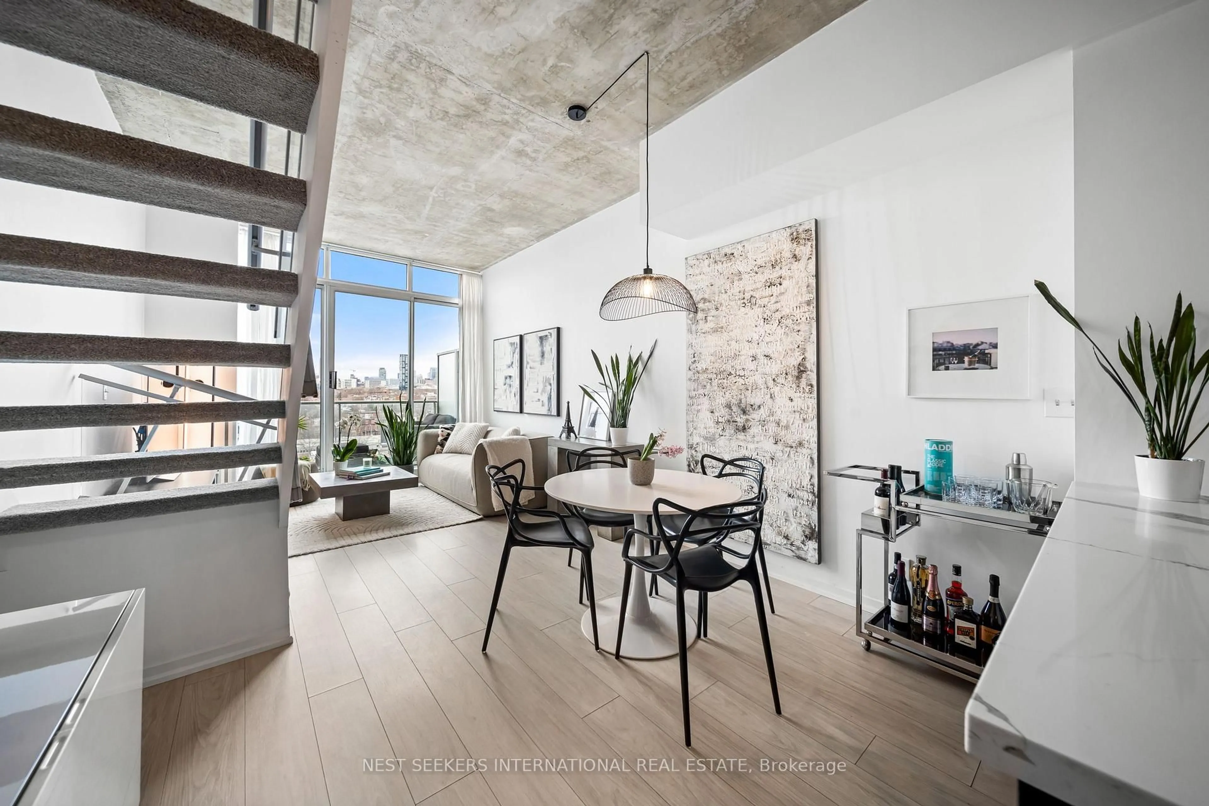 Open concept kitchen, cement floor for 388 Richmond St #919, Toronto Ontario M5V 3P1
