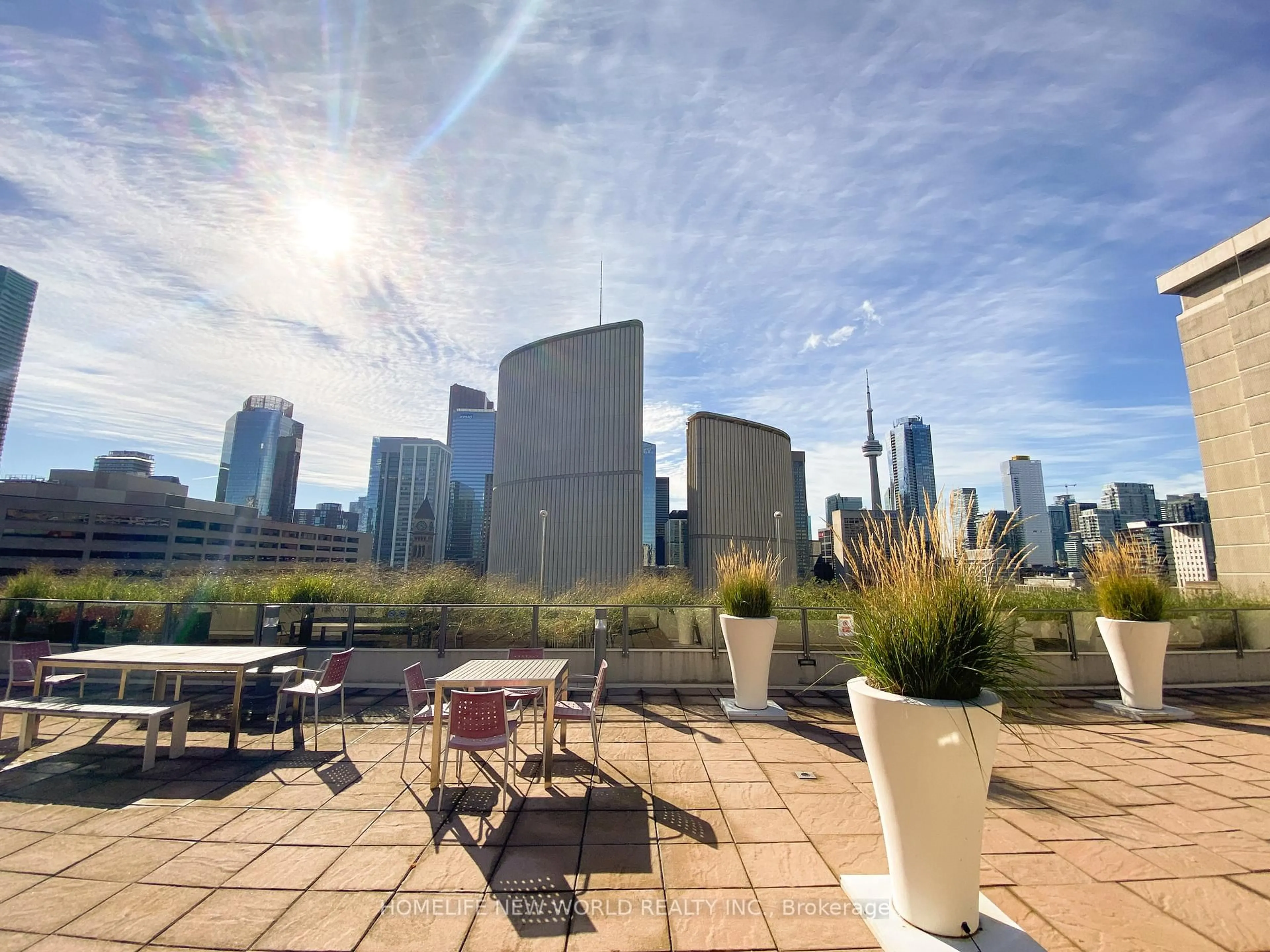 Patio, city buildings view from balcony for 111 Elizabeth St #515, Toronto Ontario M5G 1P7