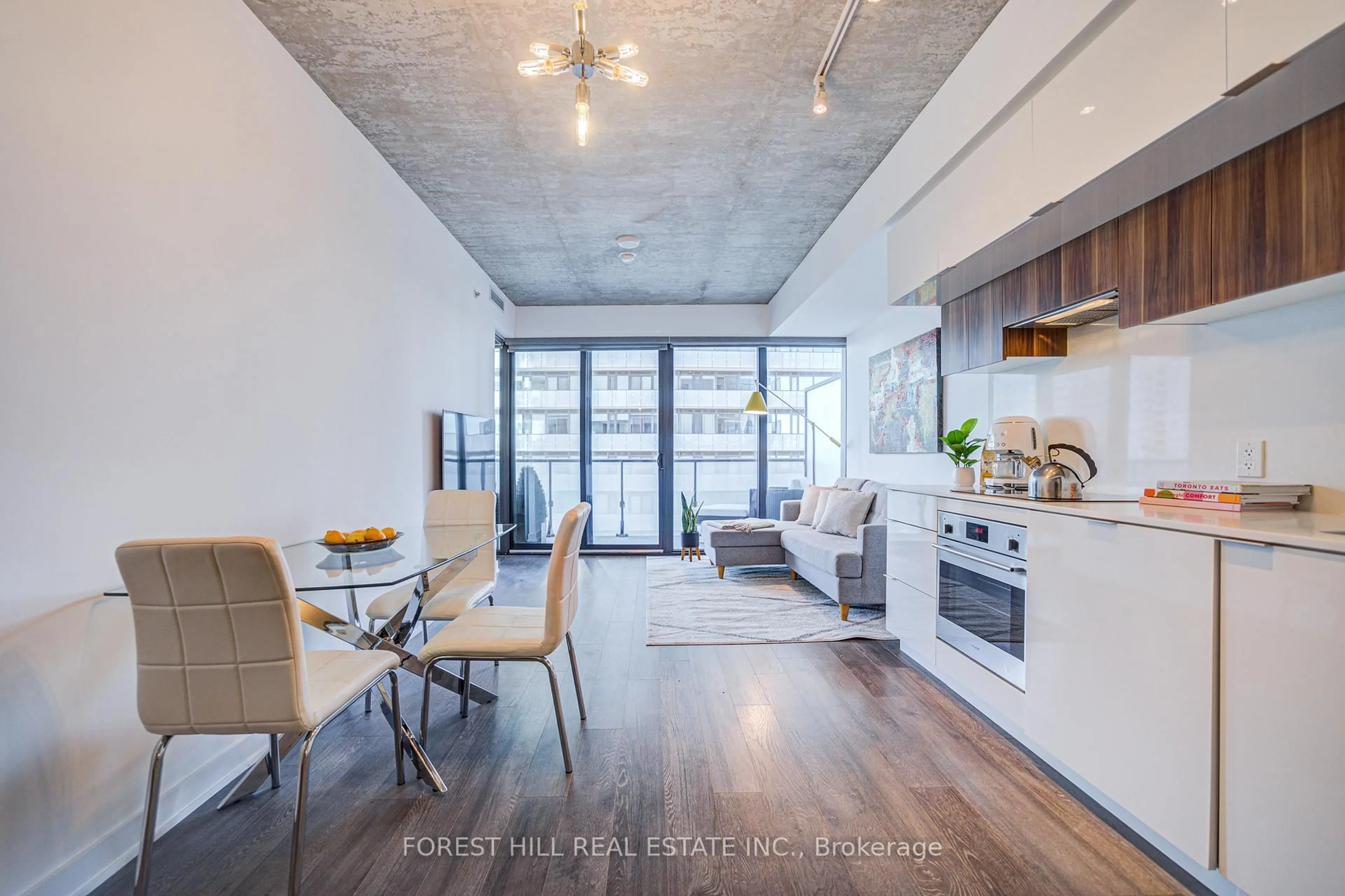 Open concept kitchen, cement floor for 185 Roehampton Ave #2501, Toronto Ontario M4P 0C6