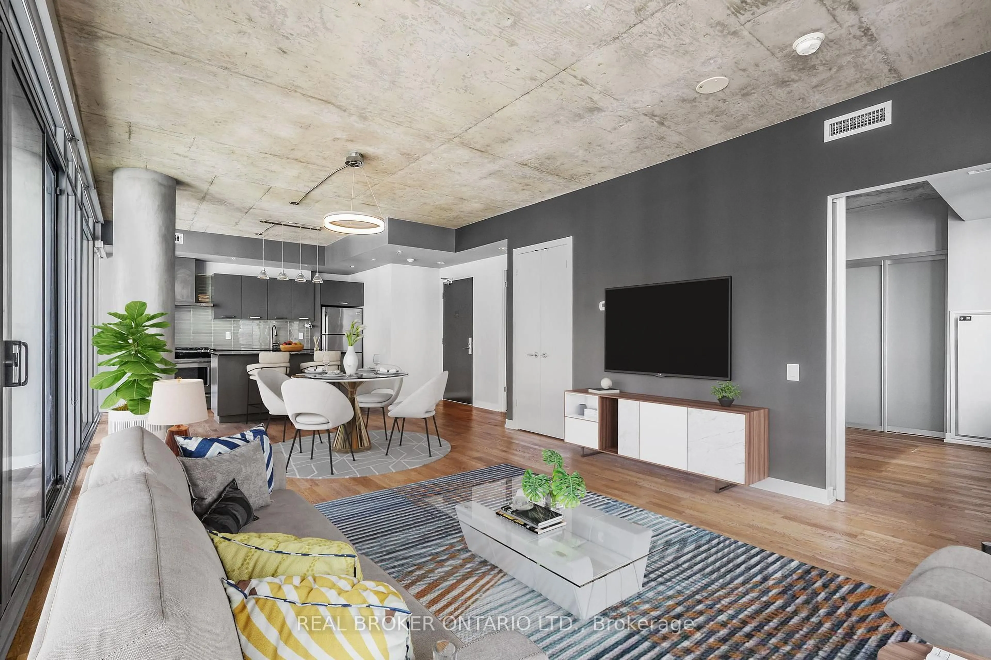 Living room with furniture, cement floor for 95 Bathurst St #1201, Toronto Ontario M5V 0H7