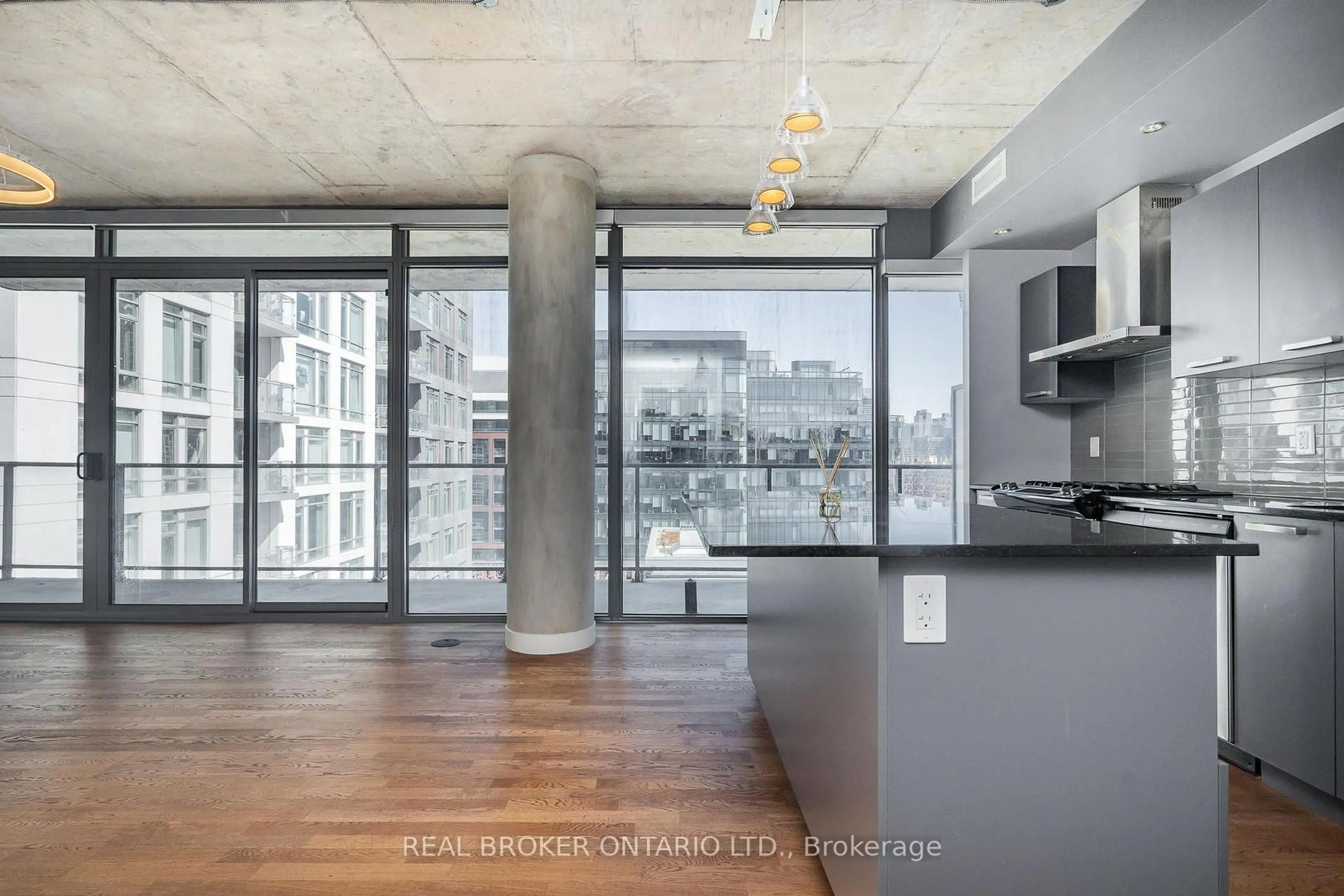 Open concept kitchen, cement floor for 95 Bathurst St #1201, Toronto Ontario M5V 0H7