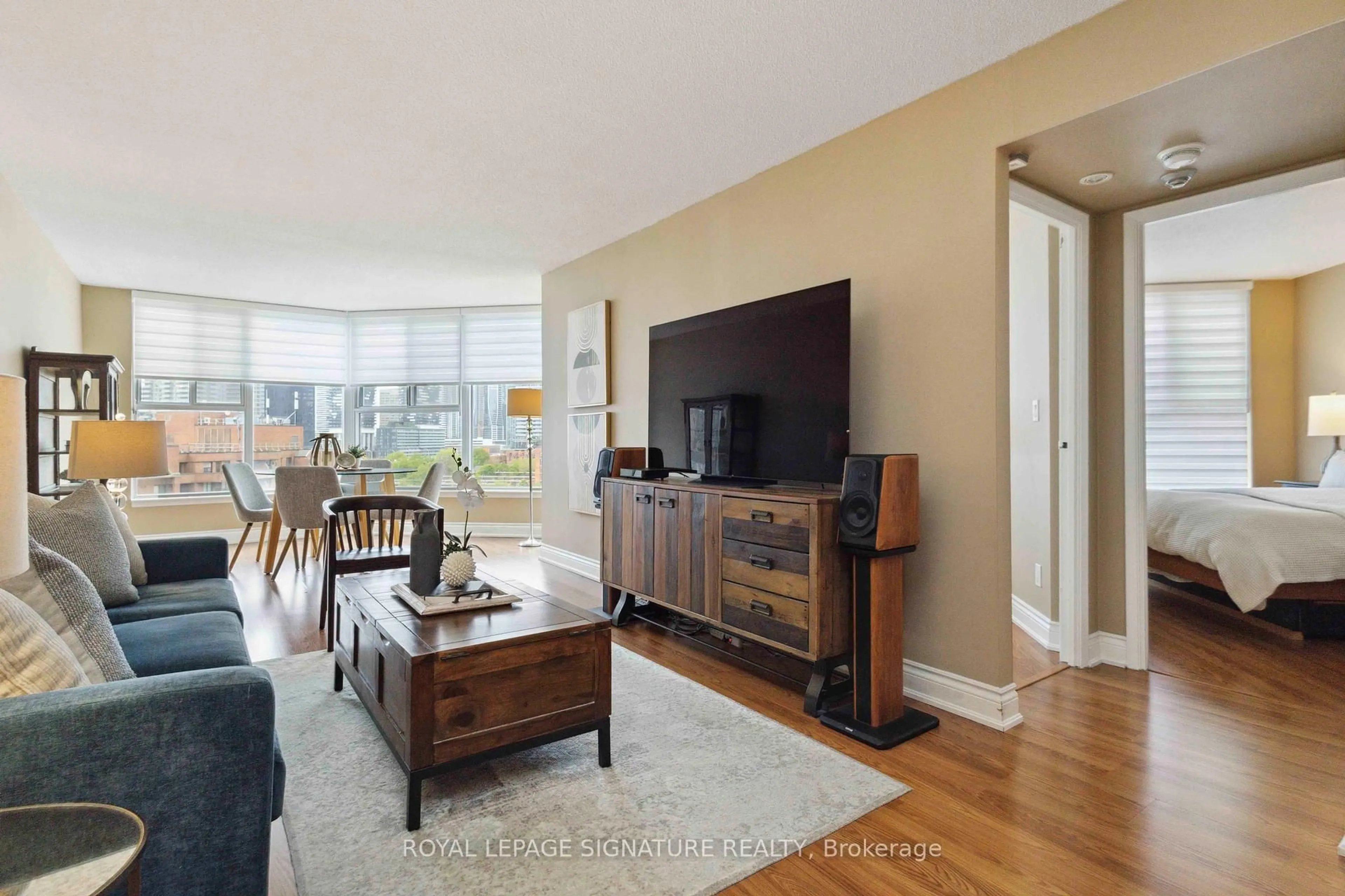 Living room with furniture, wood/laminate floor for 222 The Esplanade Ave #1007, Toronto Ontario M5A 4M8