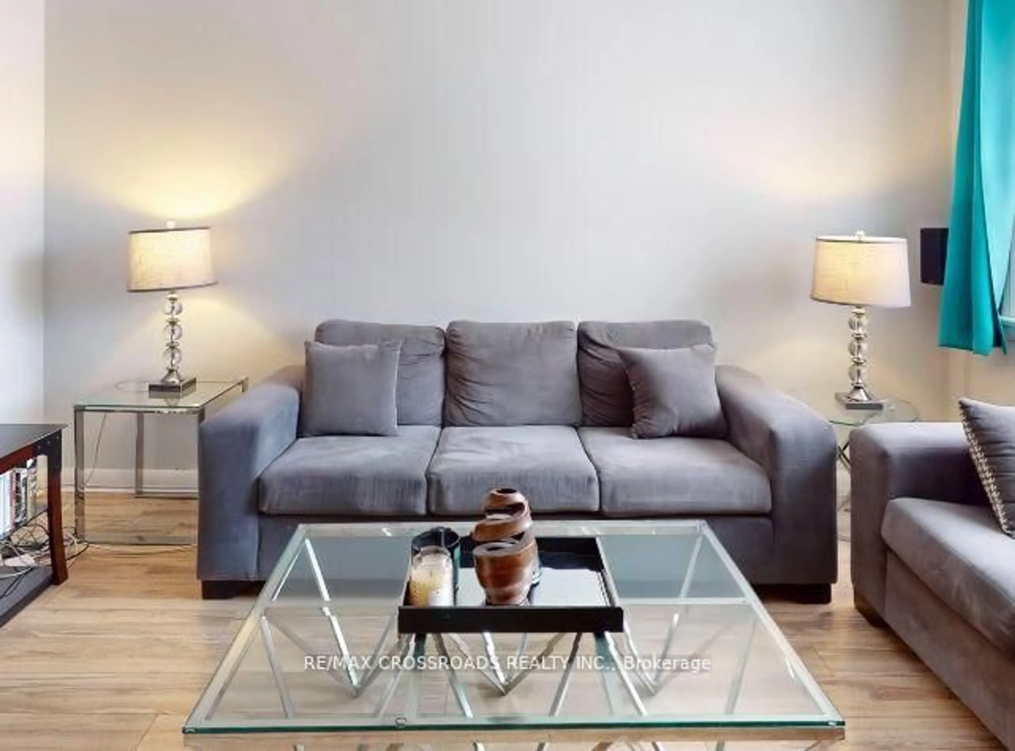 Living room with furniture, wood/laminate floor for 260 Connaught Ave, Toronto Ontario M2M 1H5