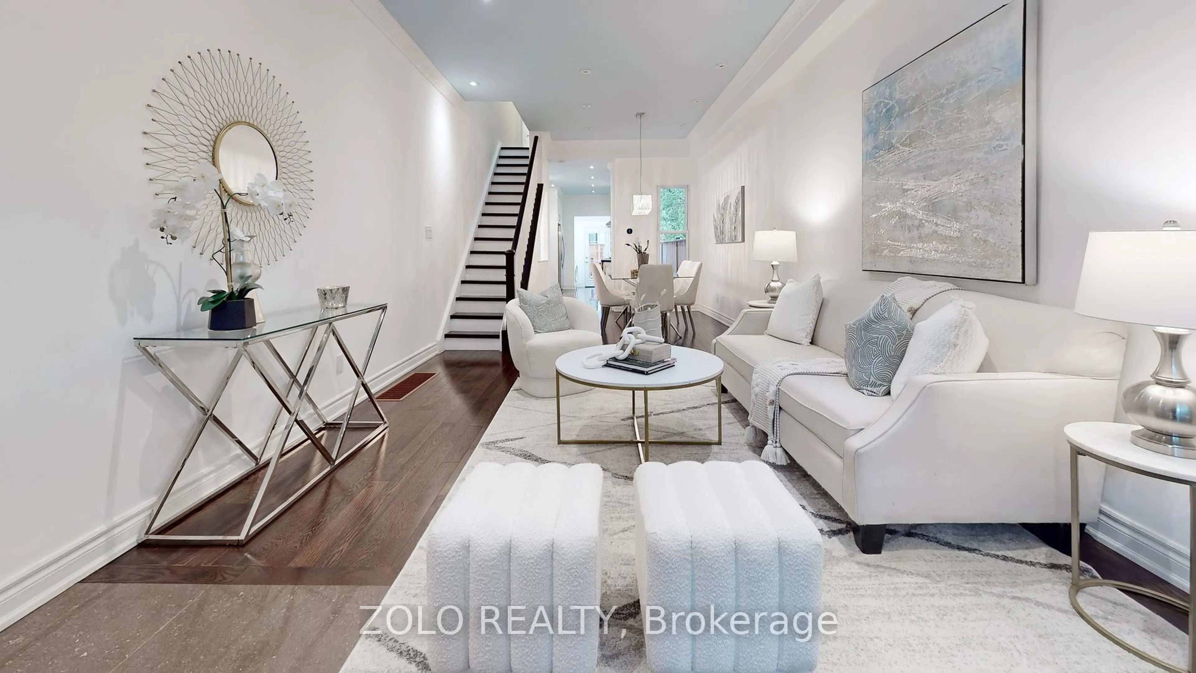 Living room with furniture, wood/laminate floor for 10 Mitchell Ave, Toronto Ontario M6J 1B9