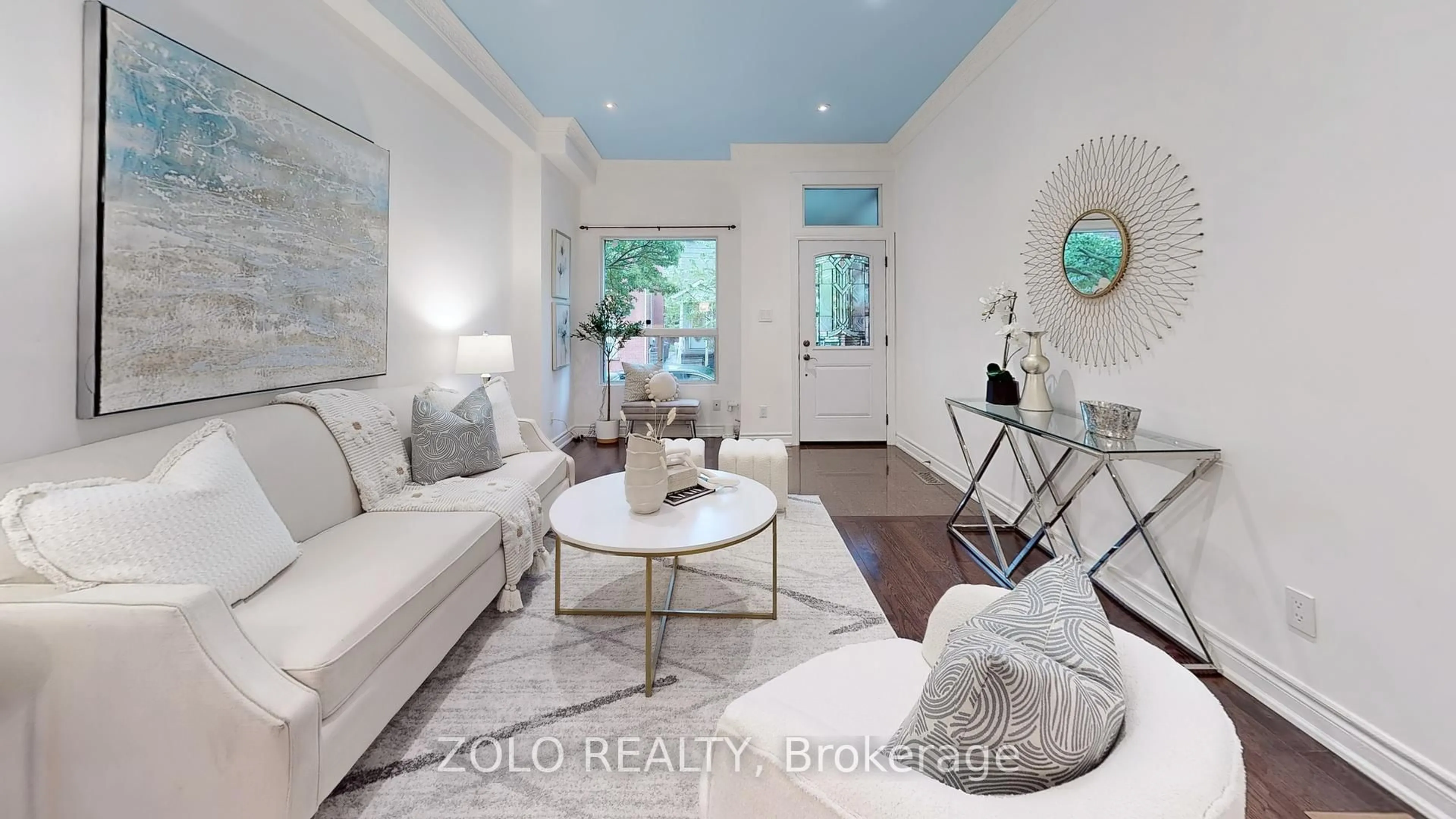 Living room with furniture, wood/laminate floor for 10 Mitchell Ave, Toronto Ontario M6J 1B9