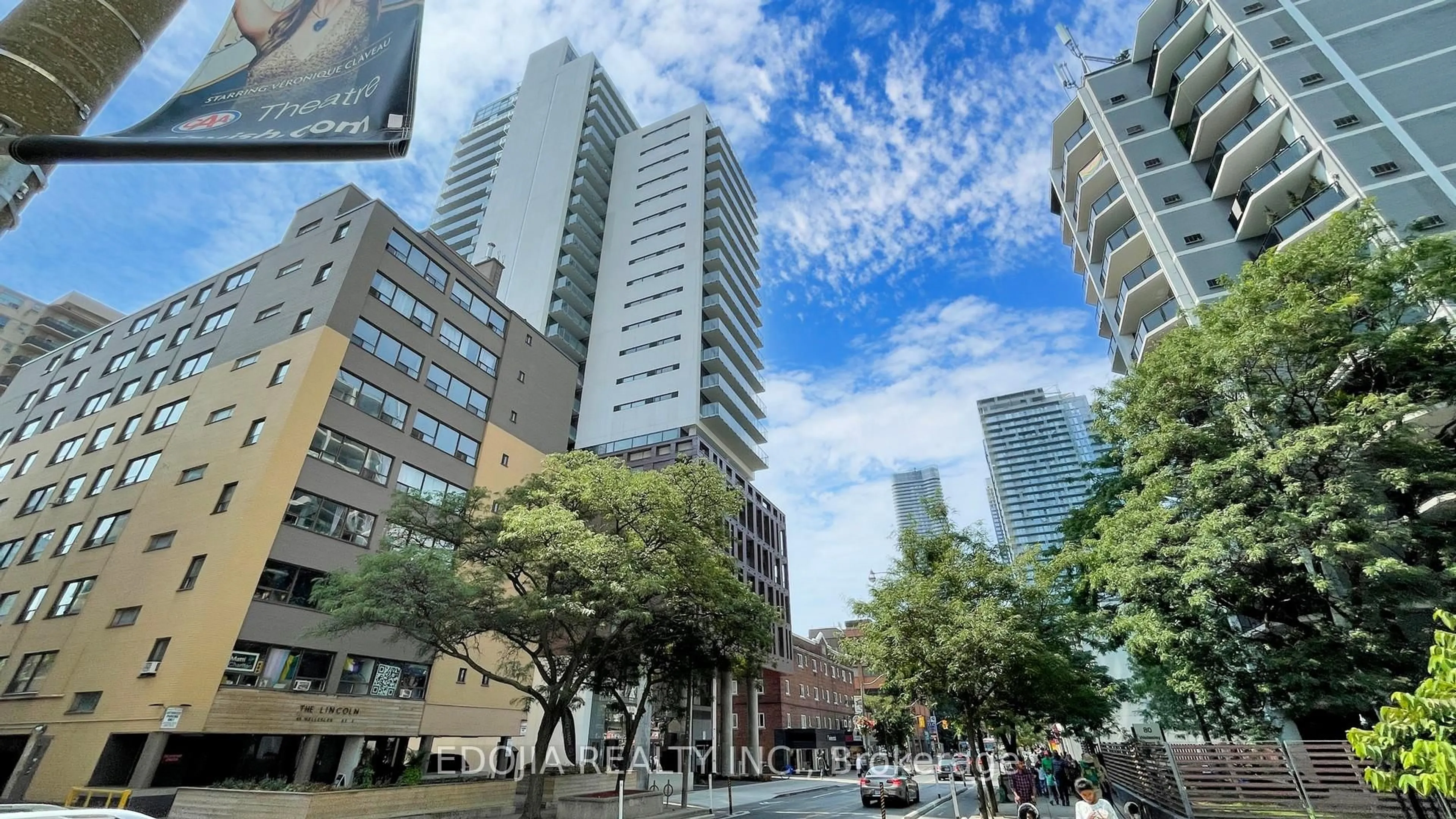 Patio, city buildings view from balcony for 81 Wellesley St #1407, Toronto Ontario M4Y 1C5