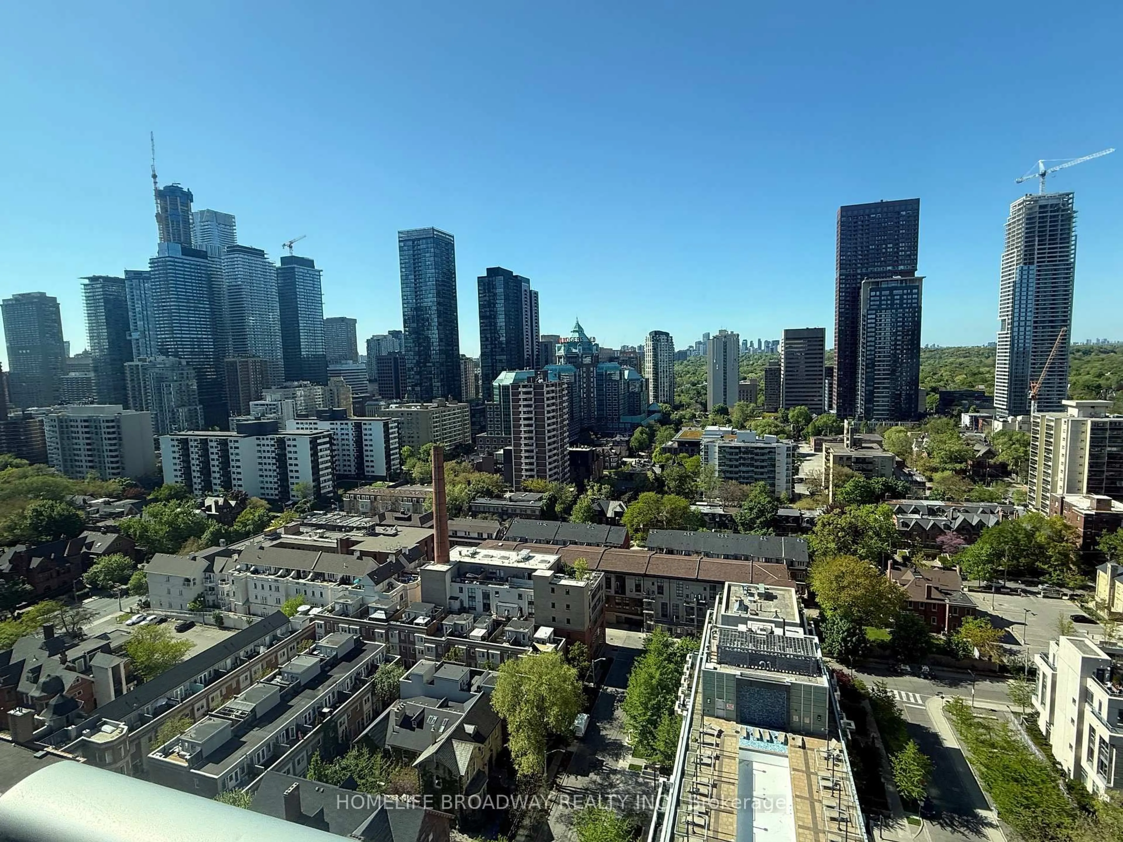 A pic from outside/outdoor area/front of a property/back of a property/a pic from drone, city buildings view from balcony for 120 Homewood Ave #2302, Toronto Ontario M4Y 2J3