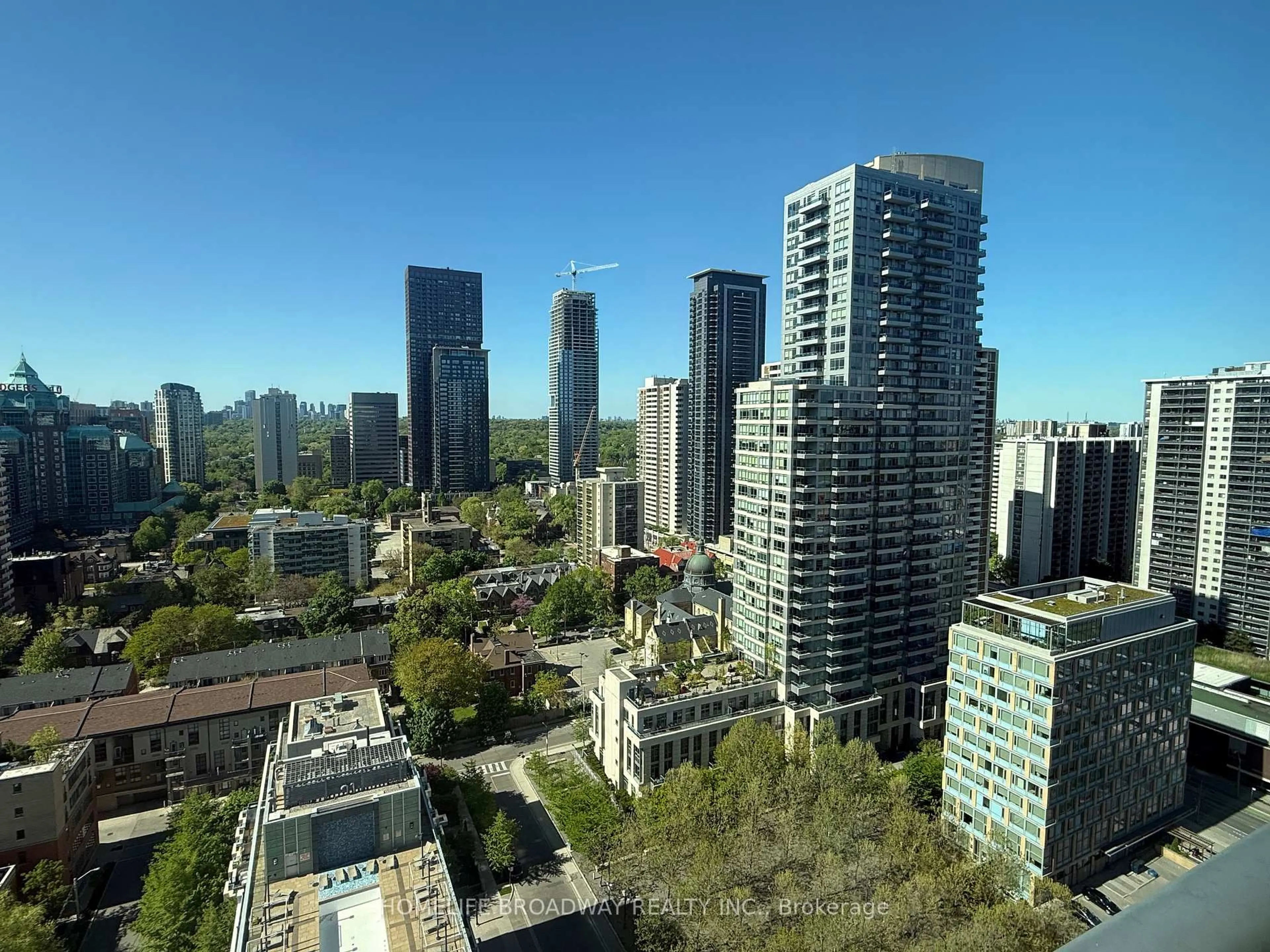 A pic from outside/outdoor area/front of a property/back of a property/a pic from drone, city buildings view from balcony for 120 Homewood Ave #2302, Toronto Ontario M4Y 2J3