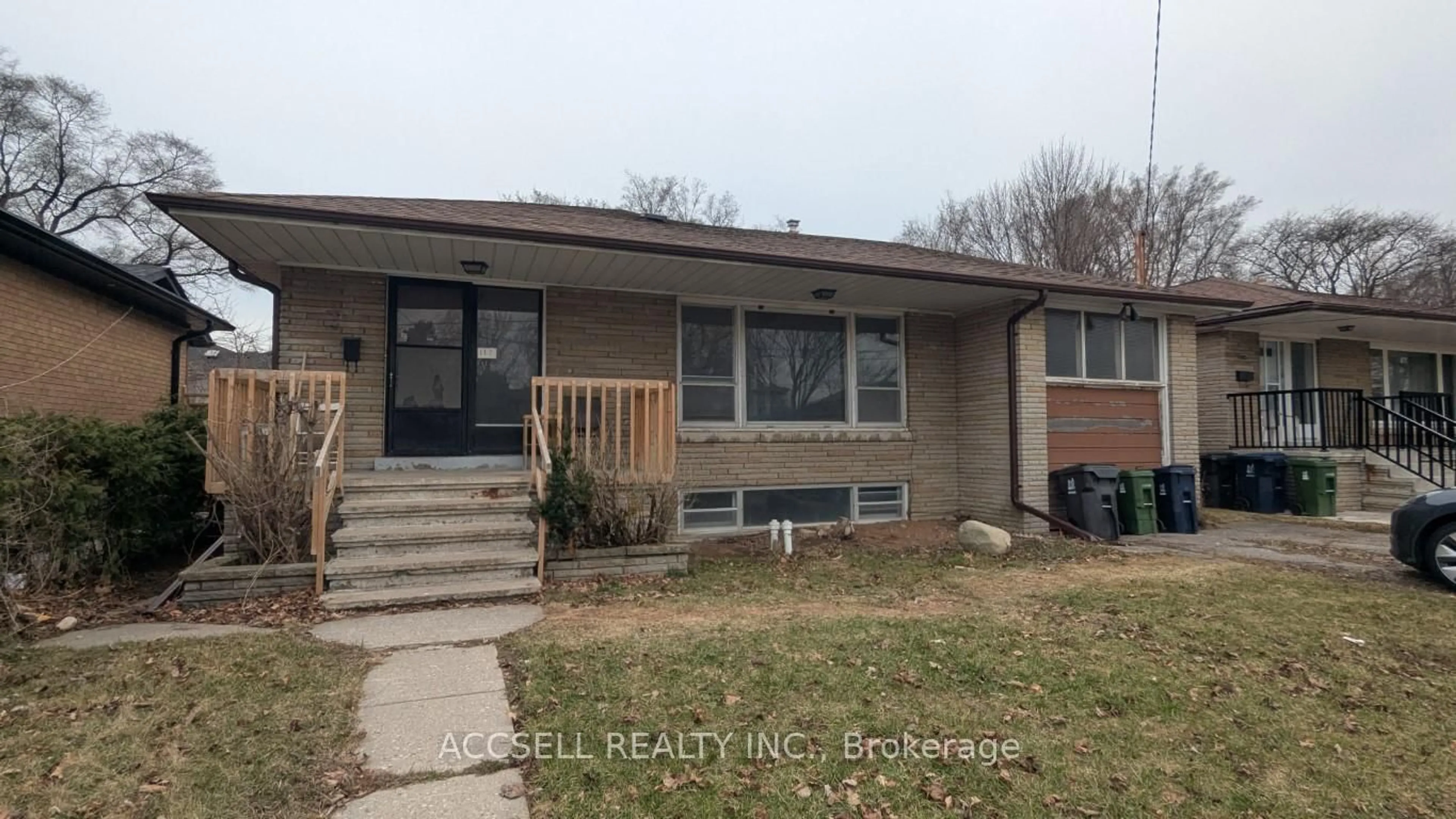 Home with brick exterior material, street for 117 Palm Dr, Toronto Ontario M3H 2C2