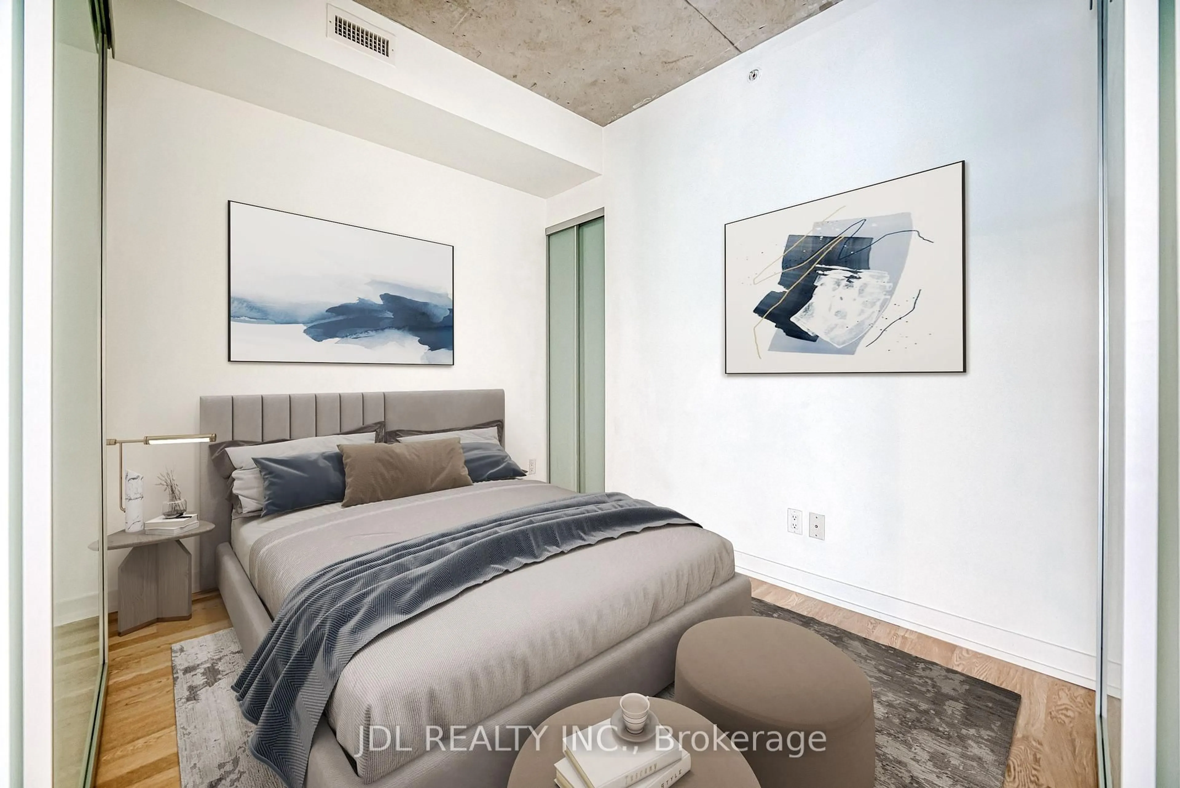 Bedroom with bed, cement floor for 461 Adelaide St #338, Toronto Ontario M5V 0L6