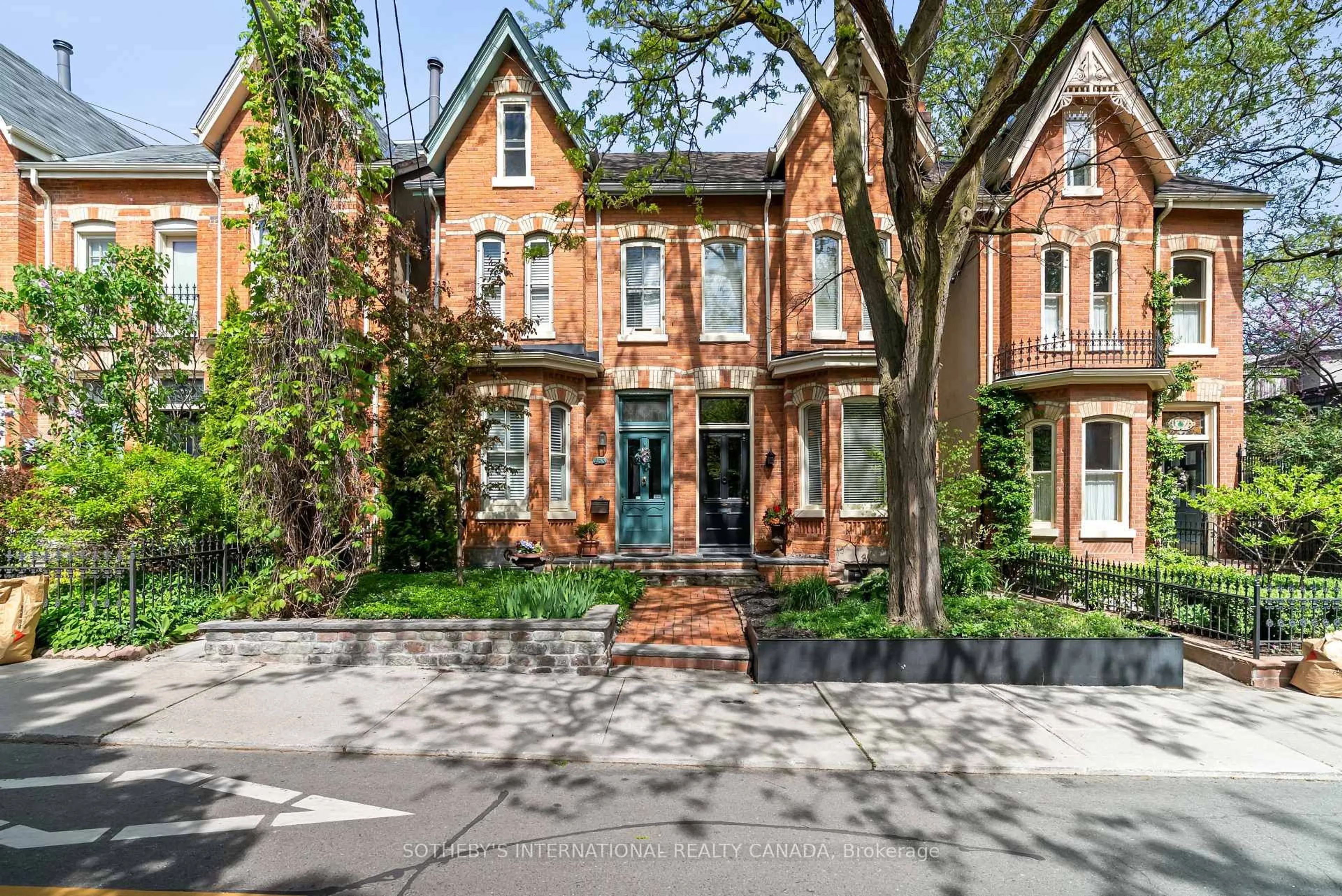 Home with brick exterior material, street for 451 Sackville St, Toronto Ontario M4X 1T3