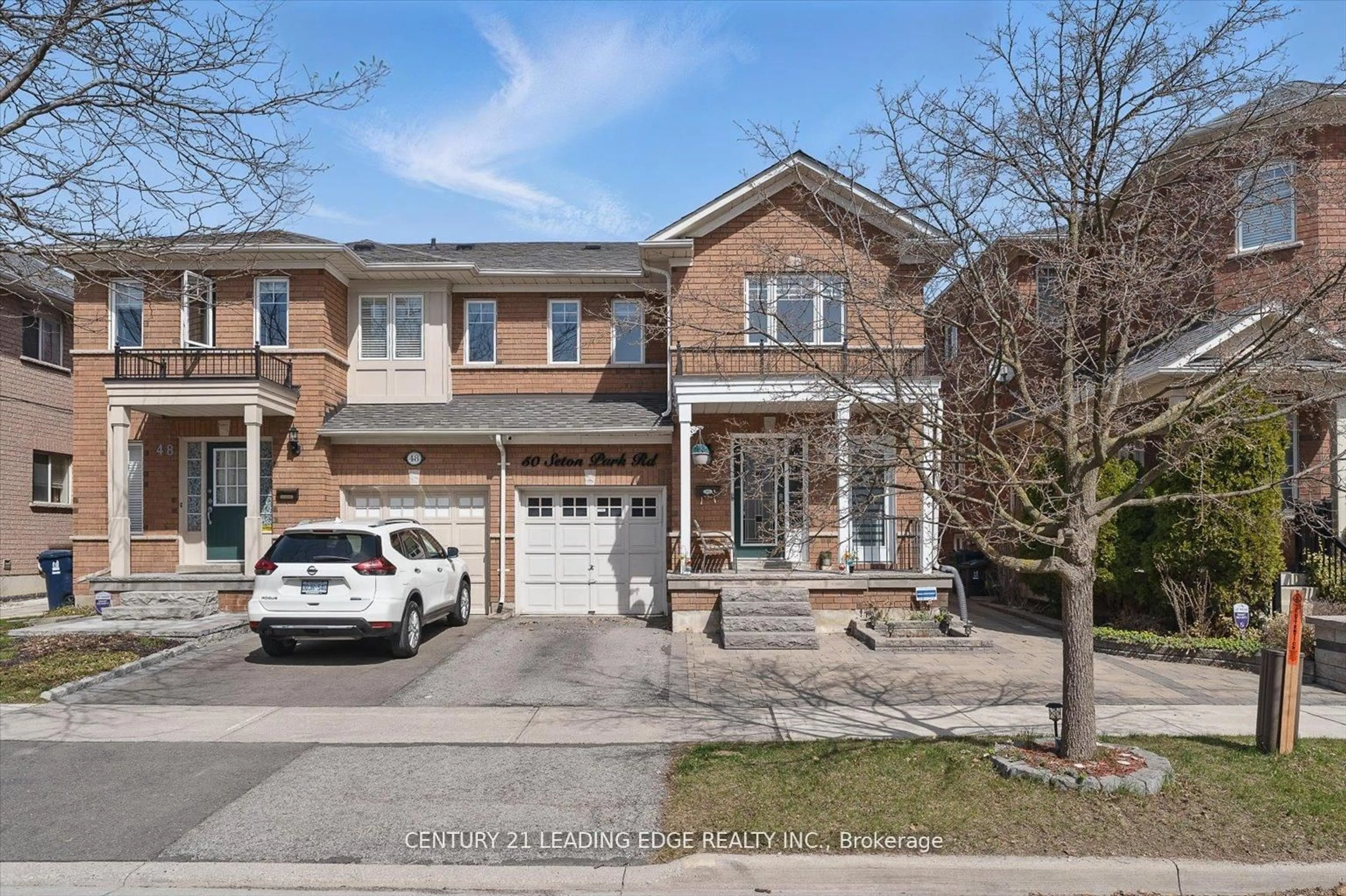 Home with brick exterior material, street for 50 Seton Park Rd, Toronto Ontario M3C 3Z6