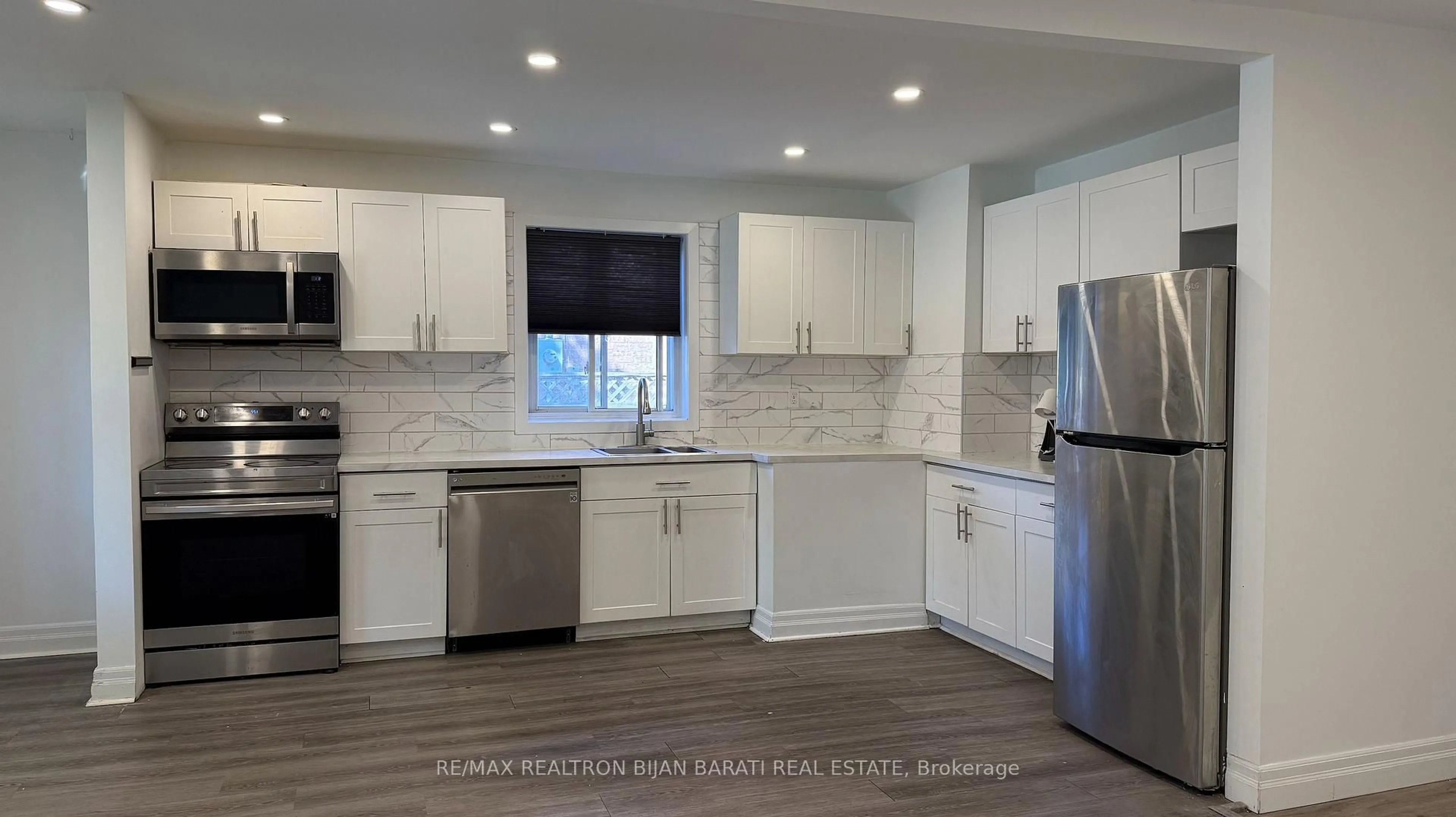 Open concept kitchen, ceramic/tile floor for 208 Olive Ave, Toronto Ontario M2N 4P6