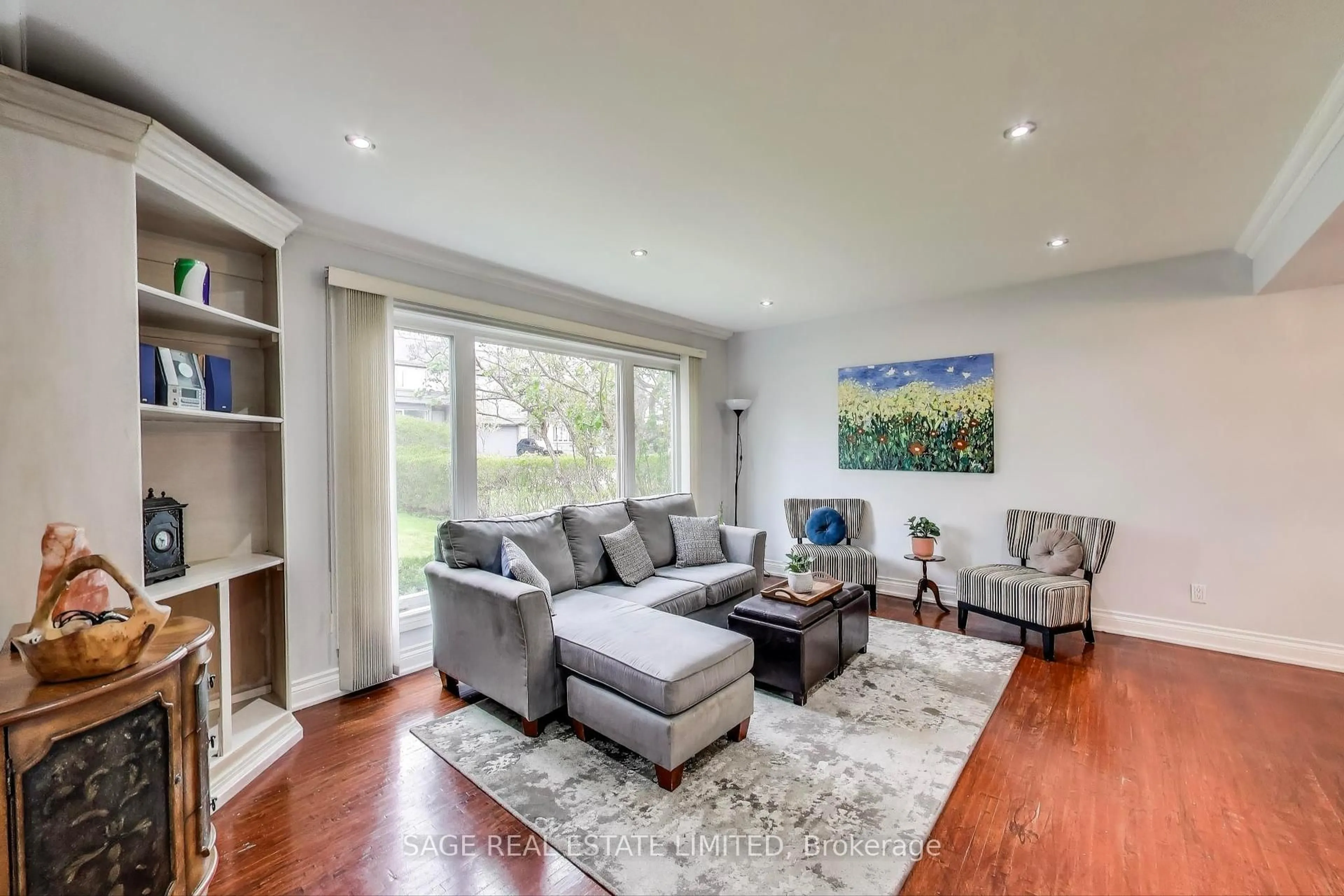Living room with furniture, wood/laminate floor for 10 Overbrook Pl, Toronto Ontario M3H 4P2