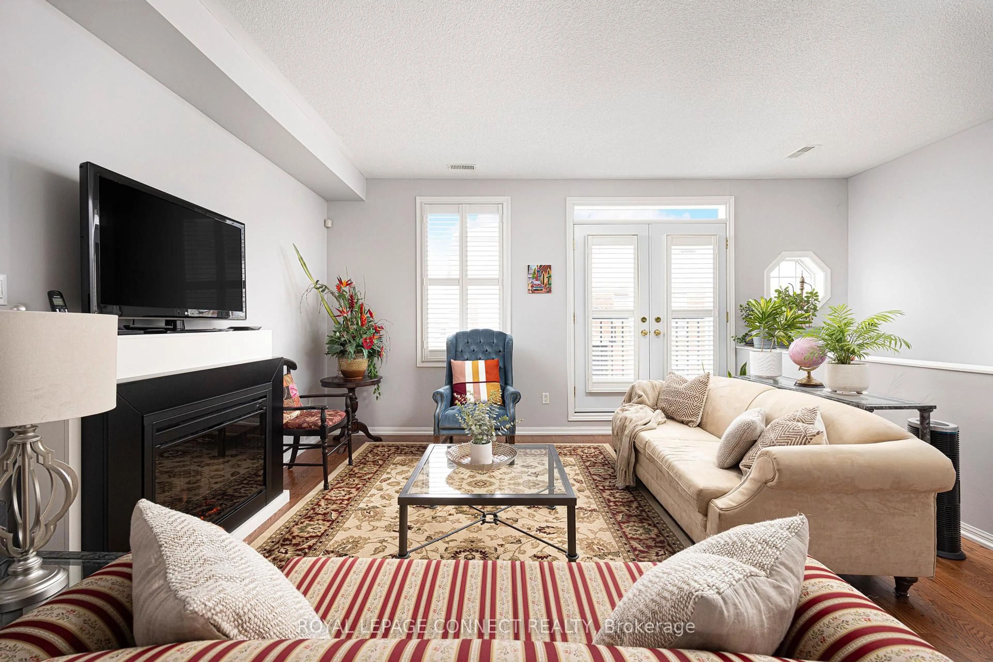 Living room with furniture, carpet floor for 51 Halton St #228, Toronto Ontario M6J 1R5