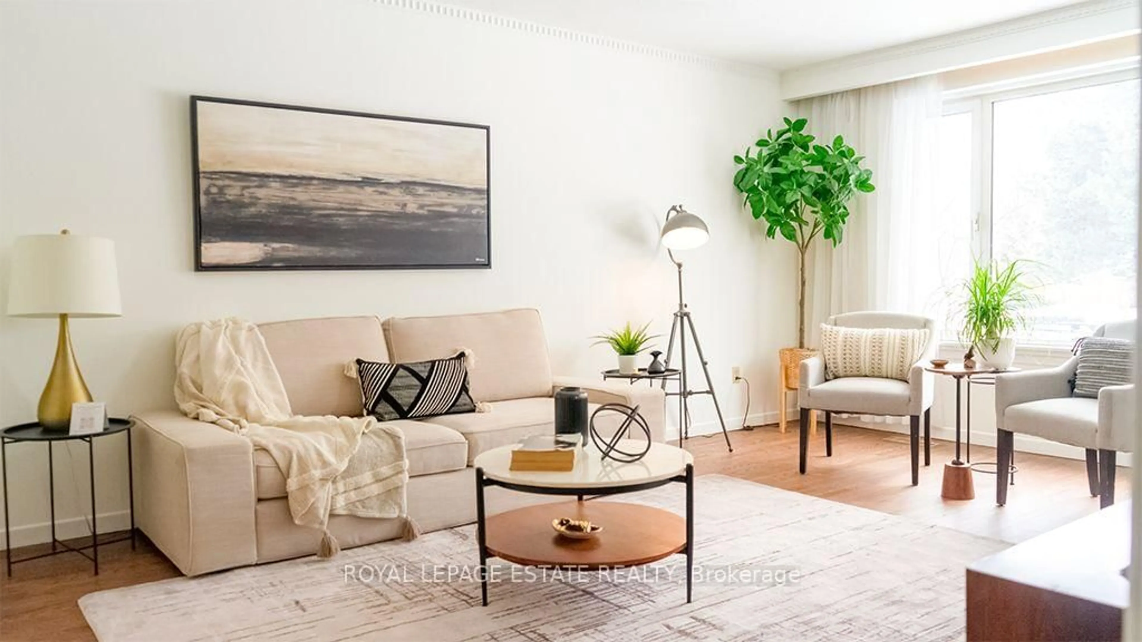 Living room with furniture, wood/laminate floor for 40 Dukinfield Cres, Toronto Ontario M3A 2S1