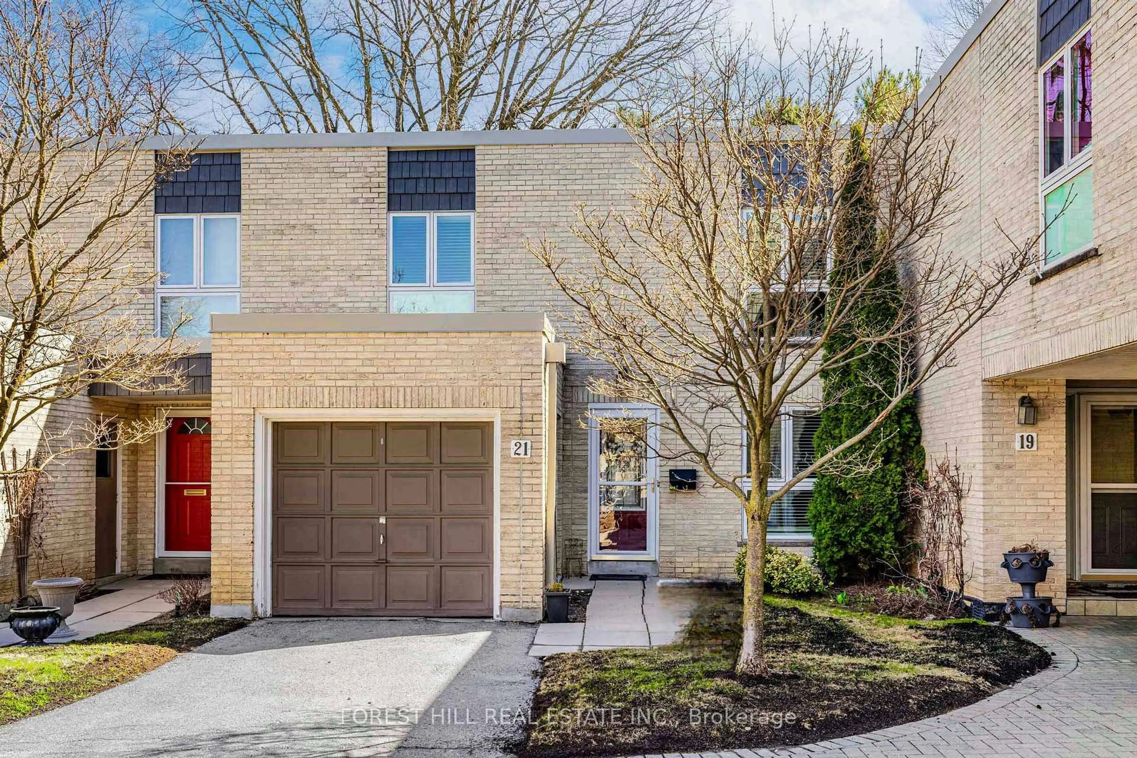 Home with brick exterior material, street for 21 Snowshoe Mill Way, Toronto Ontario M2L 1T4