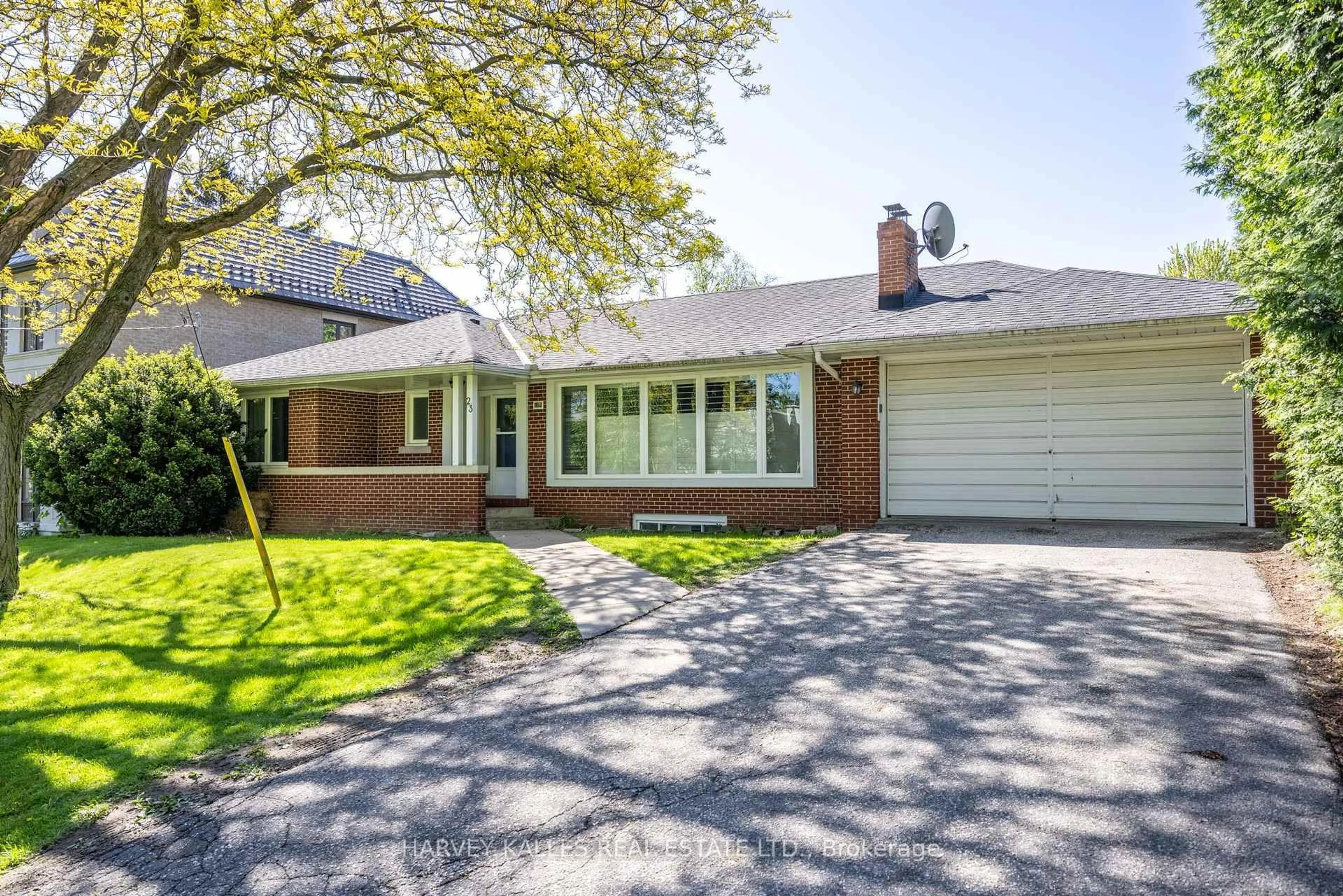 Home with brick exterior material, street for 23 Rothmere Dr, Toronto Ontario M4N 1V3