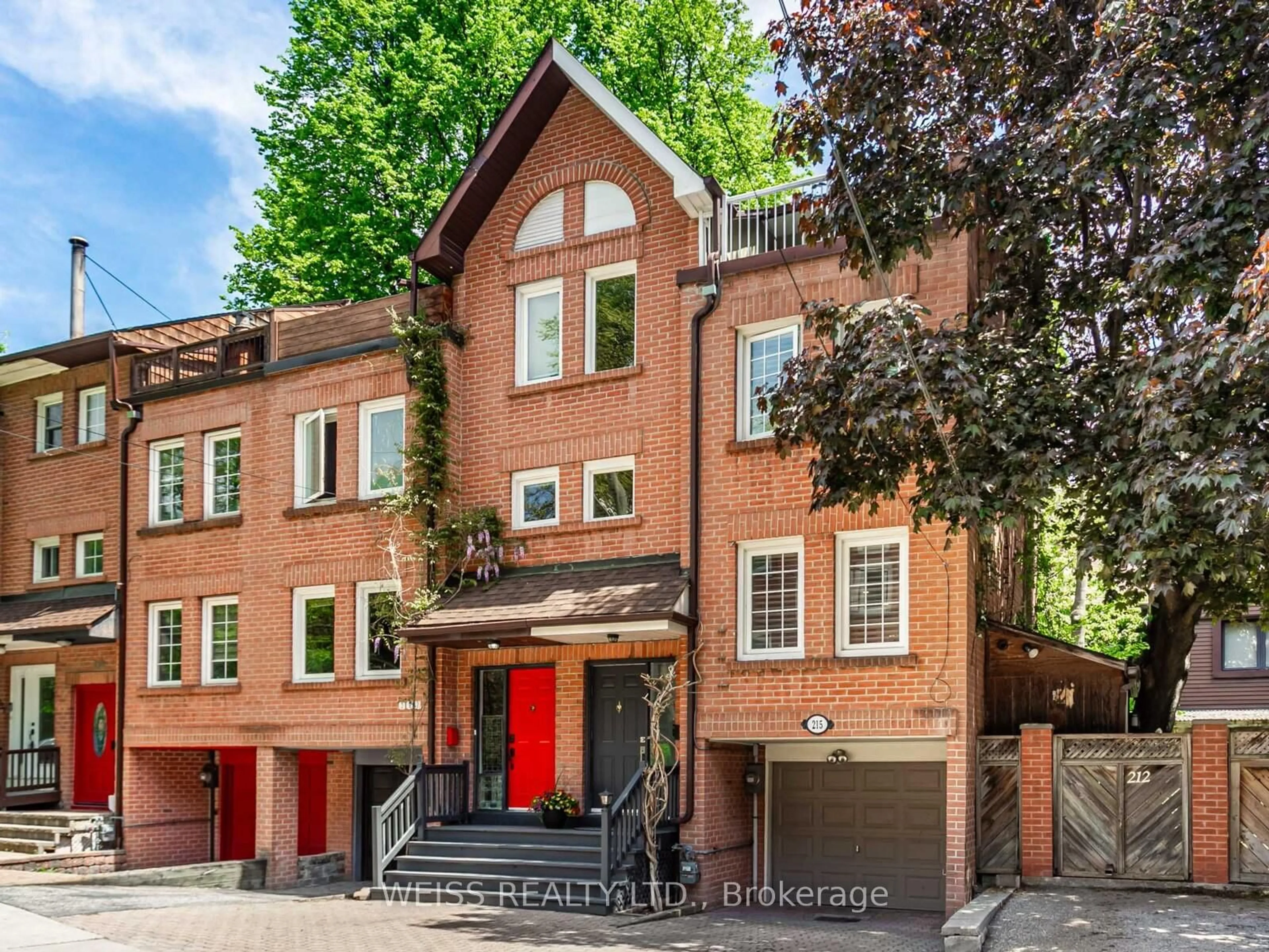 Home with brick exterior material, street for 215 Milan St, Toronto Ontario M5A 4C3