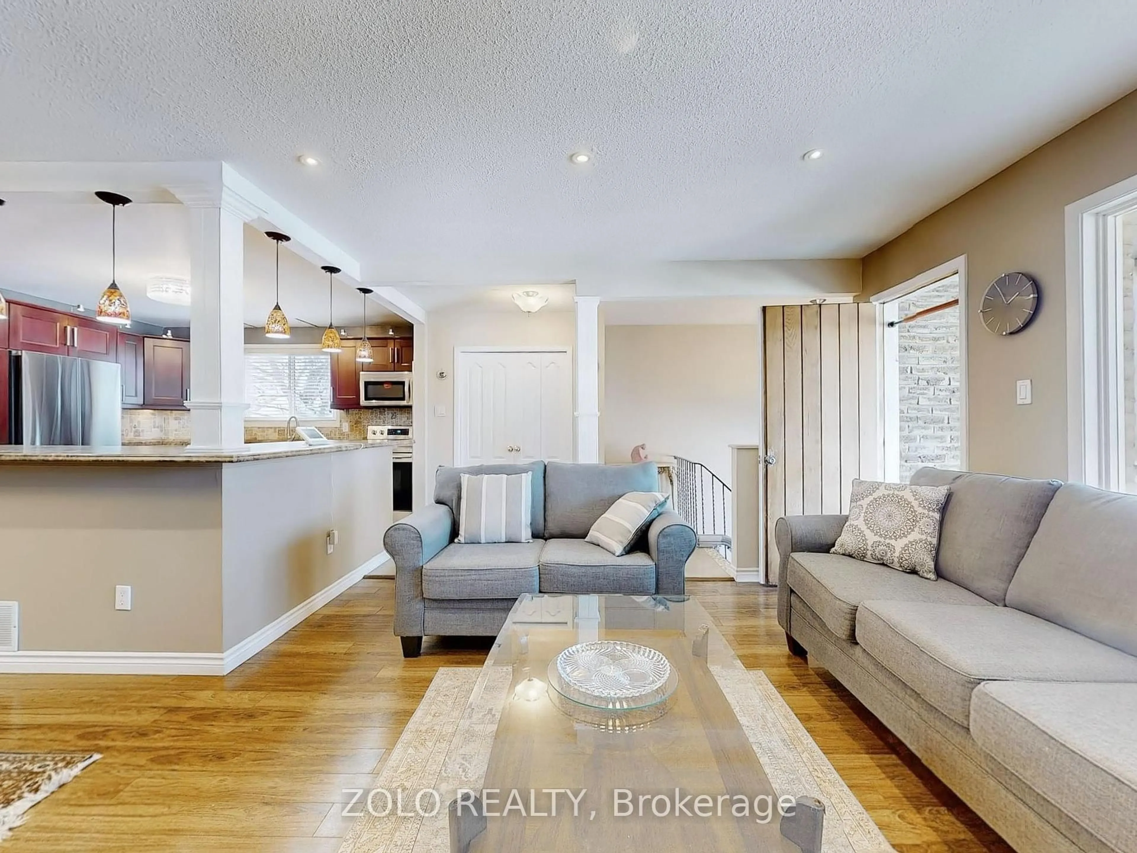Living room with furniture, wood/laminate floor for 82 Sexton Cres, Toronto Ontario M2H 2L6