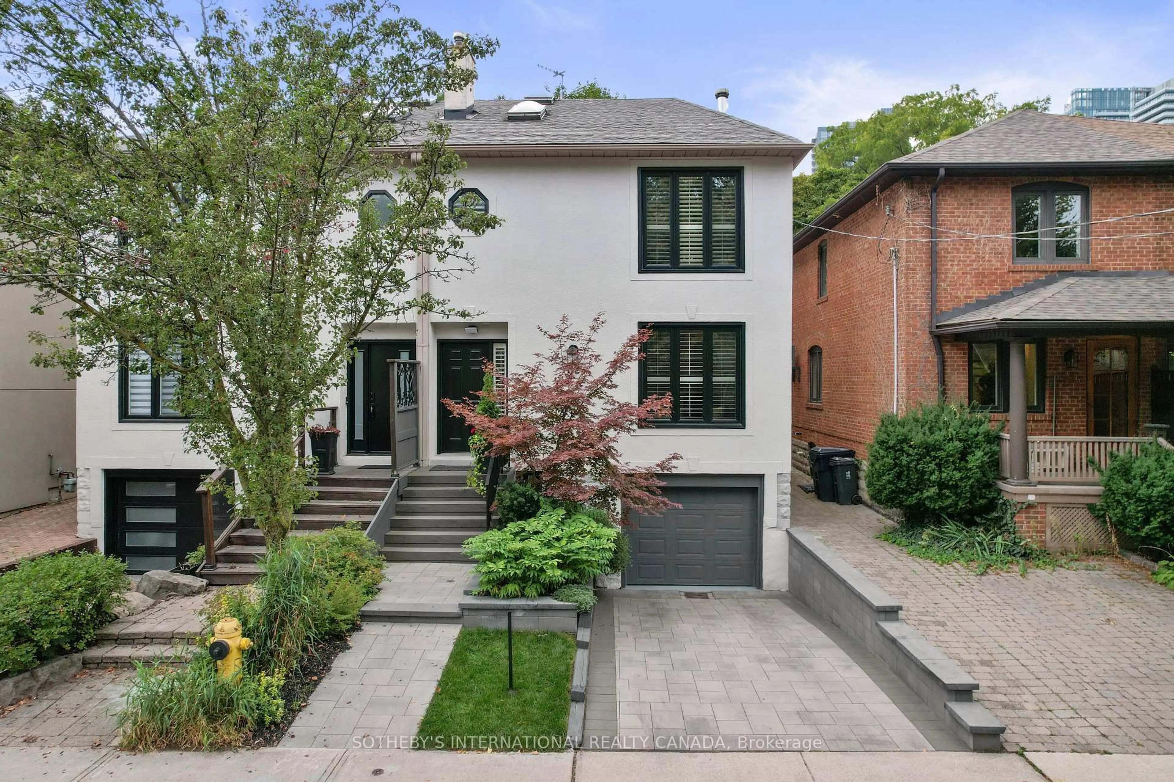 Home with brick exterior material, street for 52 Taunton Rd, Toronto Ontario M4S 2P1