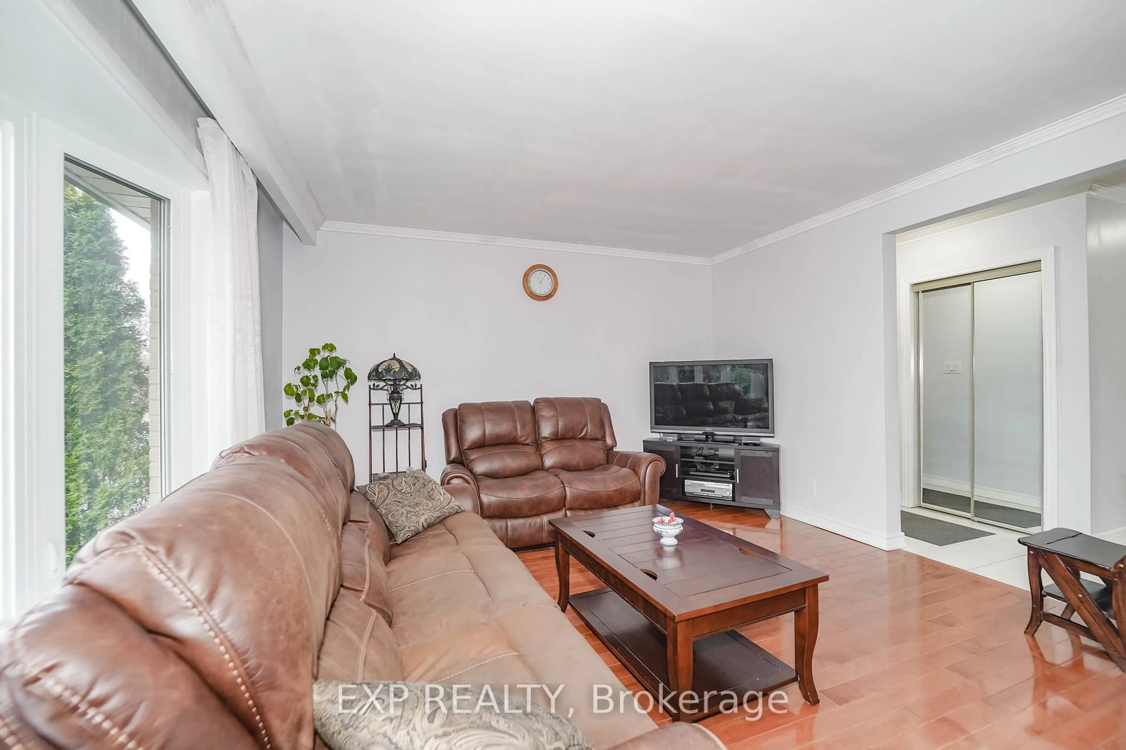 Living room with furniture, wood/laminate floor for 47 Combe Ave, Toronto Ontario M3H 4J5