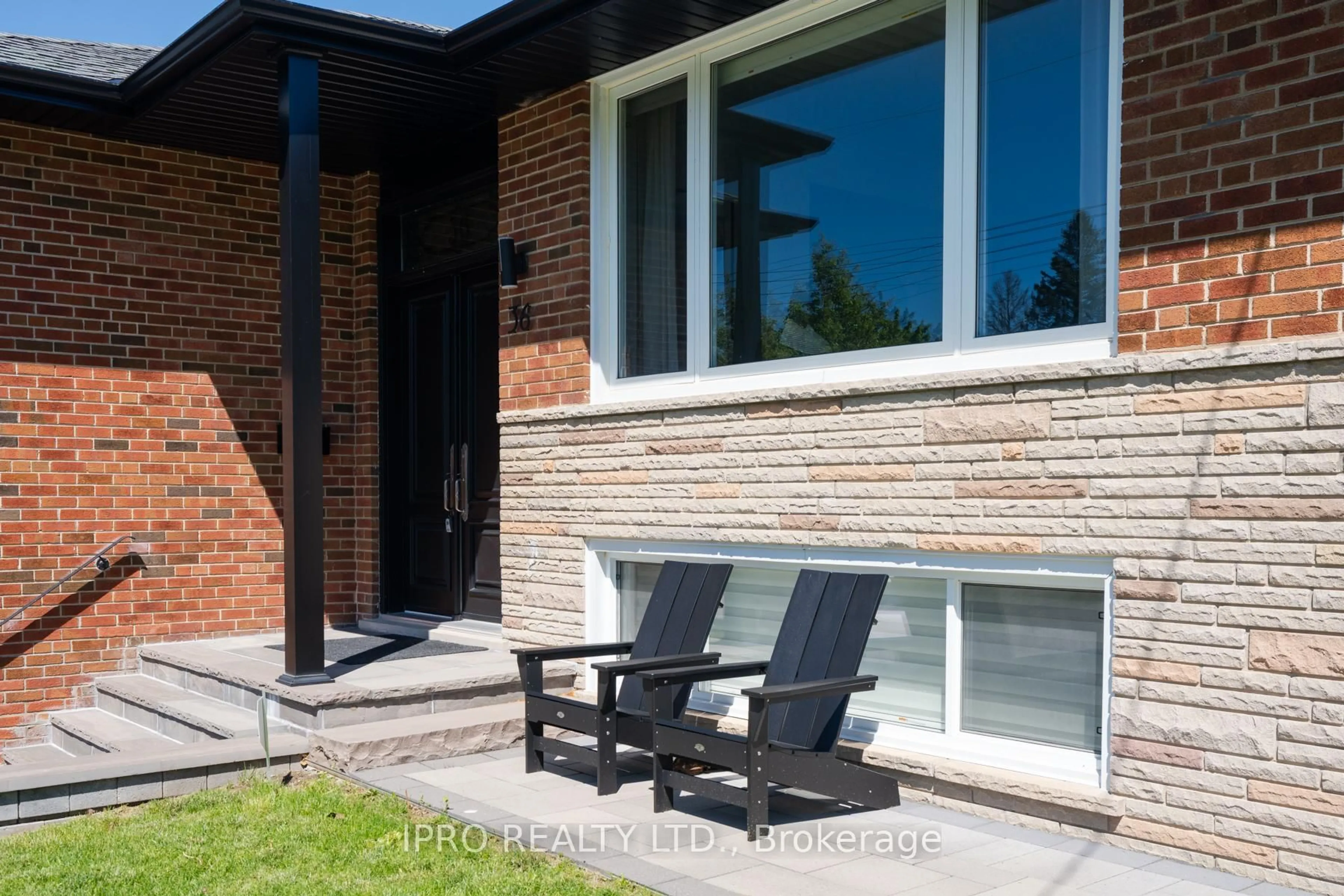 Home with brick exterior material, street for 36 Ruscica Dr, Toronto Ontario M4A 1R1