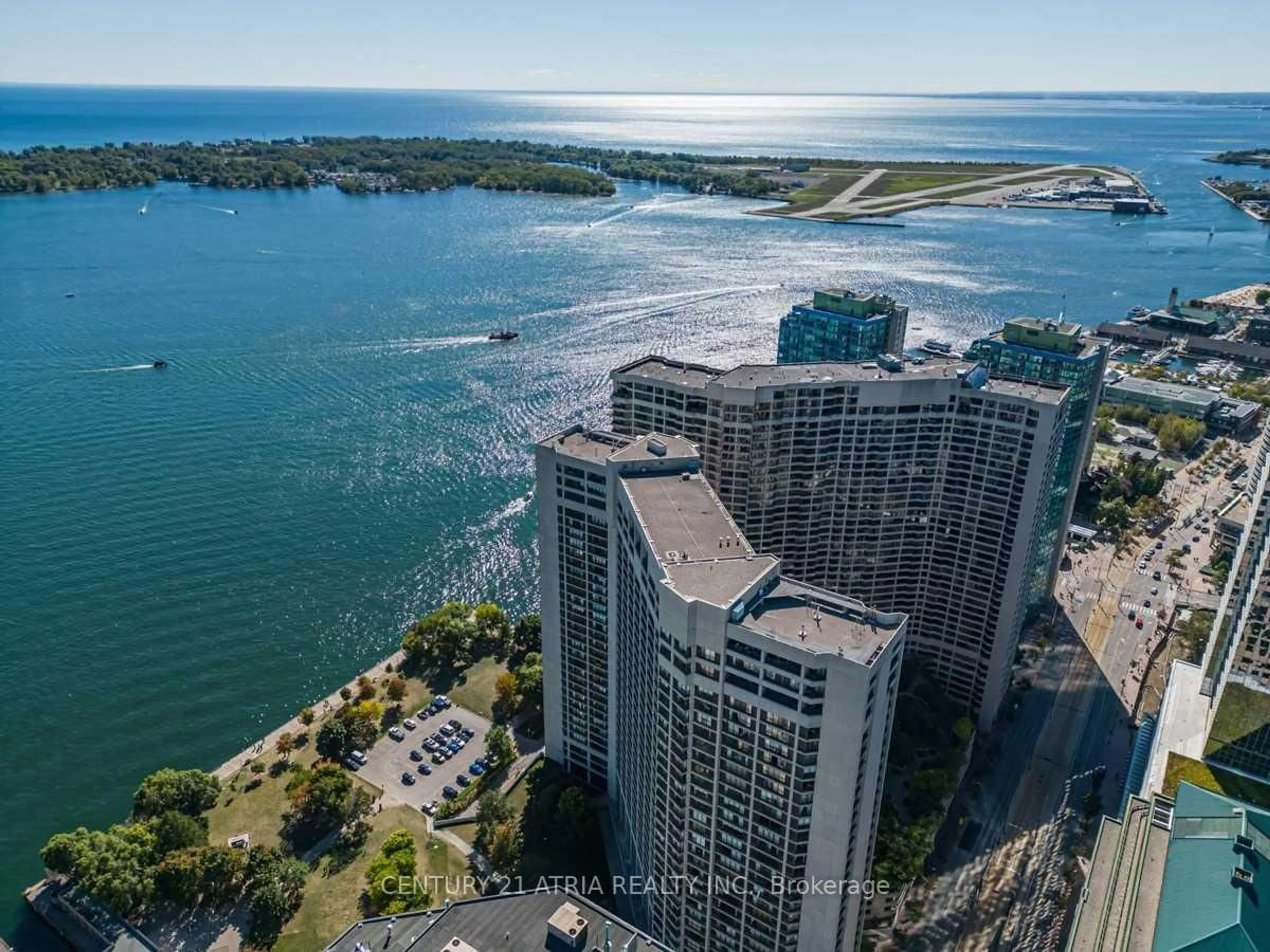 A pic from outside/outdoor area/front of a property/back of a property/a pic from drone, water/lake/river/ocean view for 65 Harbour Sq #1401, Toronto Ontario M5J 2L4