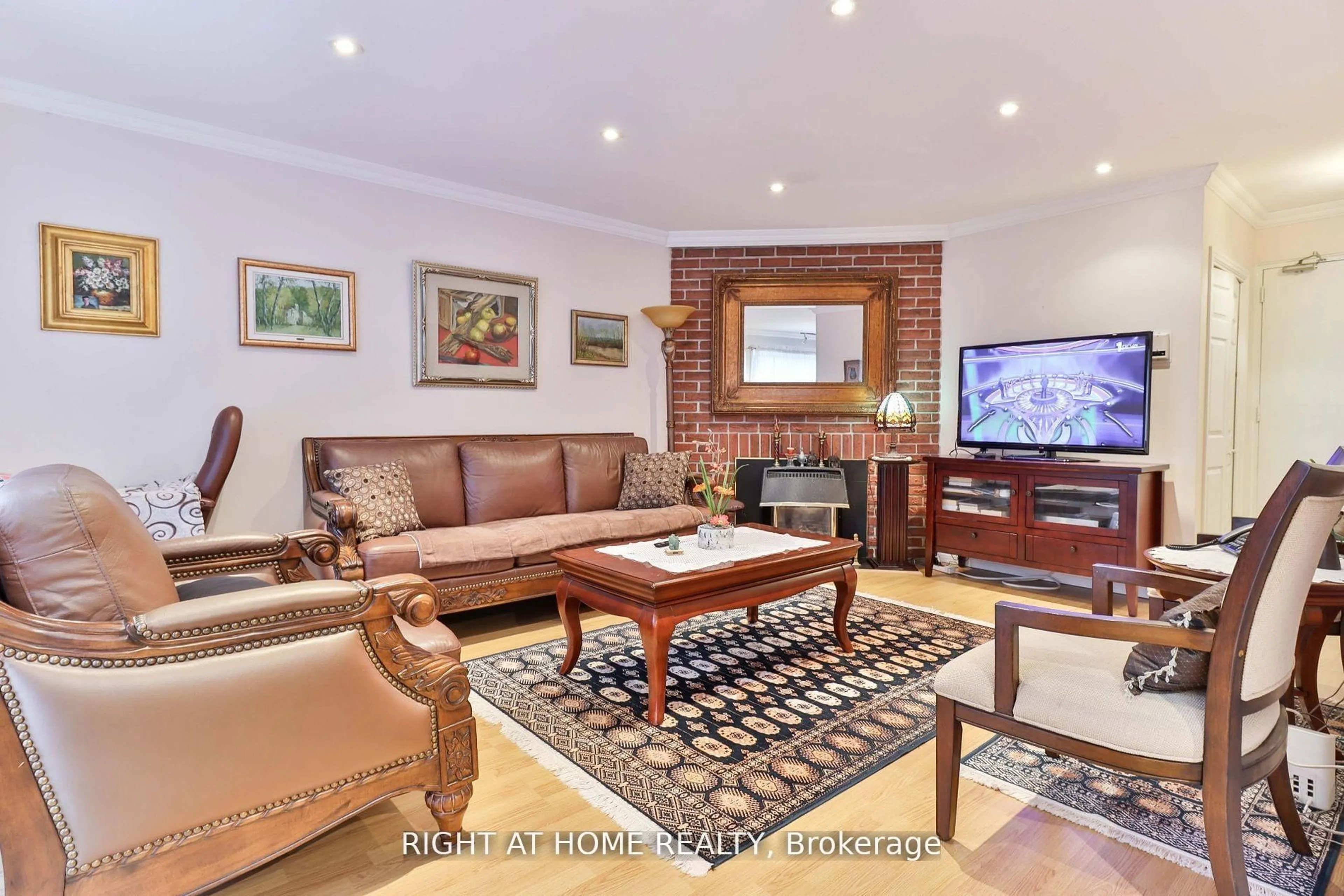 Living room with furniture, unknown for 50 Three Valleys Dr #12, Toronto Ontario M3A 3B5