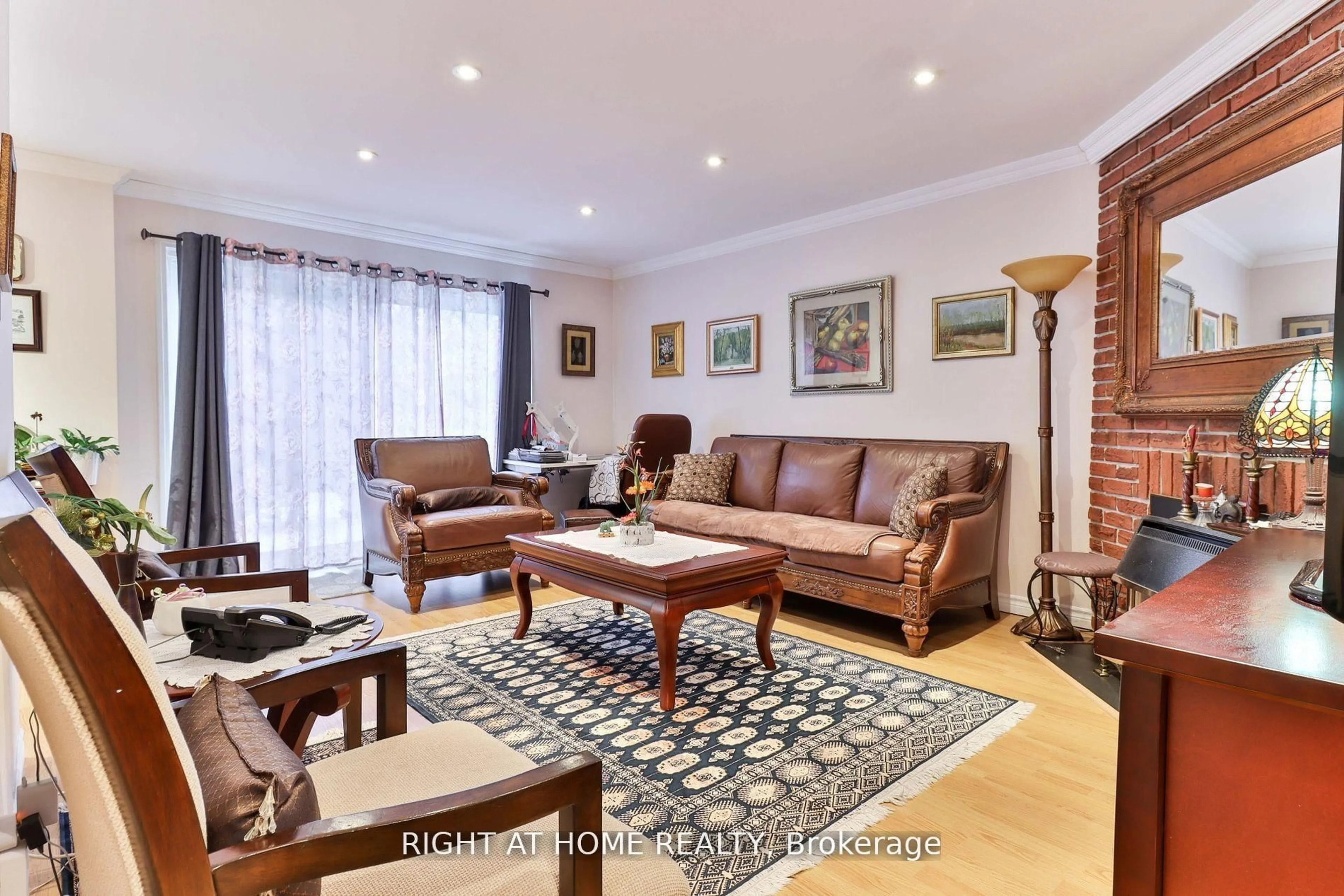 Living room with furniture, unknown for 50 Three Valleys Dr #12, Toronto Ontario M3A 3B5